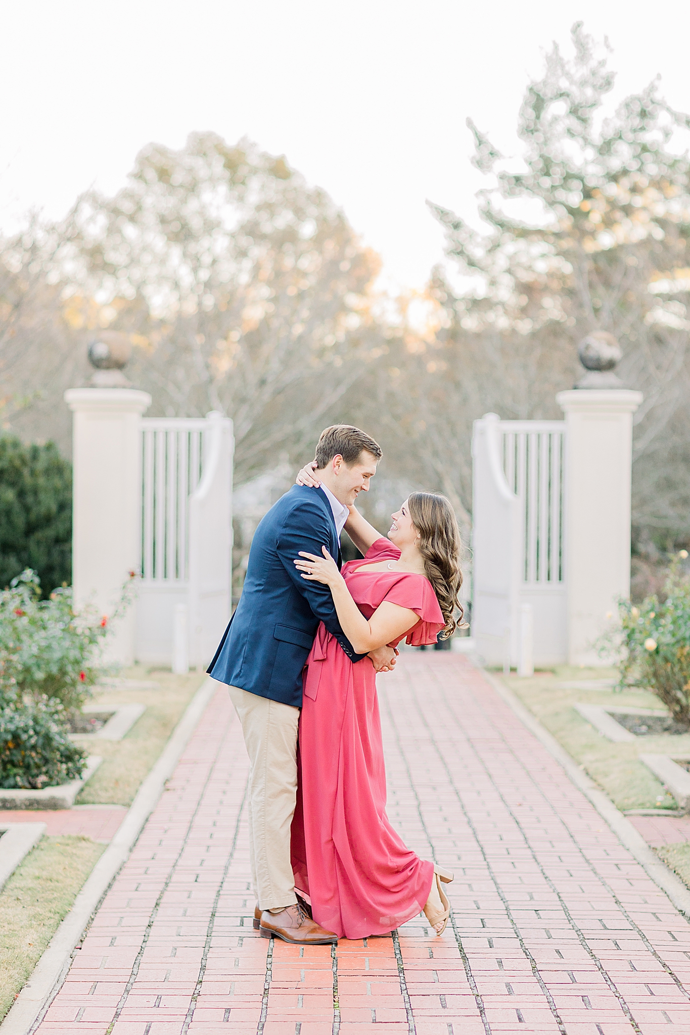 fall engagement session with bride and groom hugging
