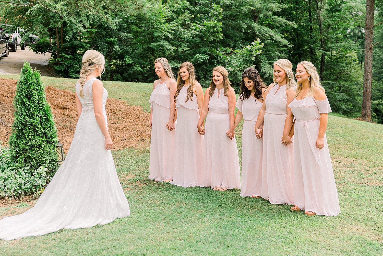 bridesmaids first look with bride in Alabama