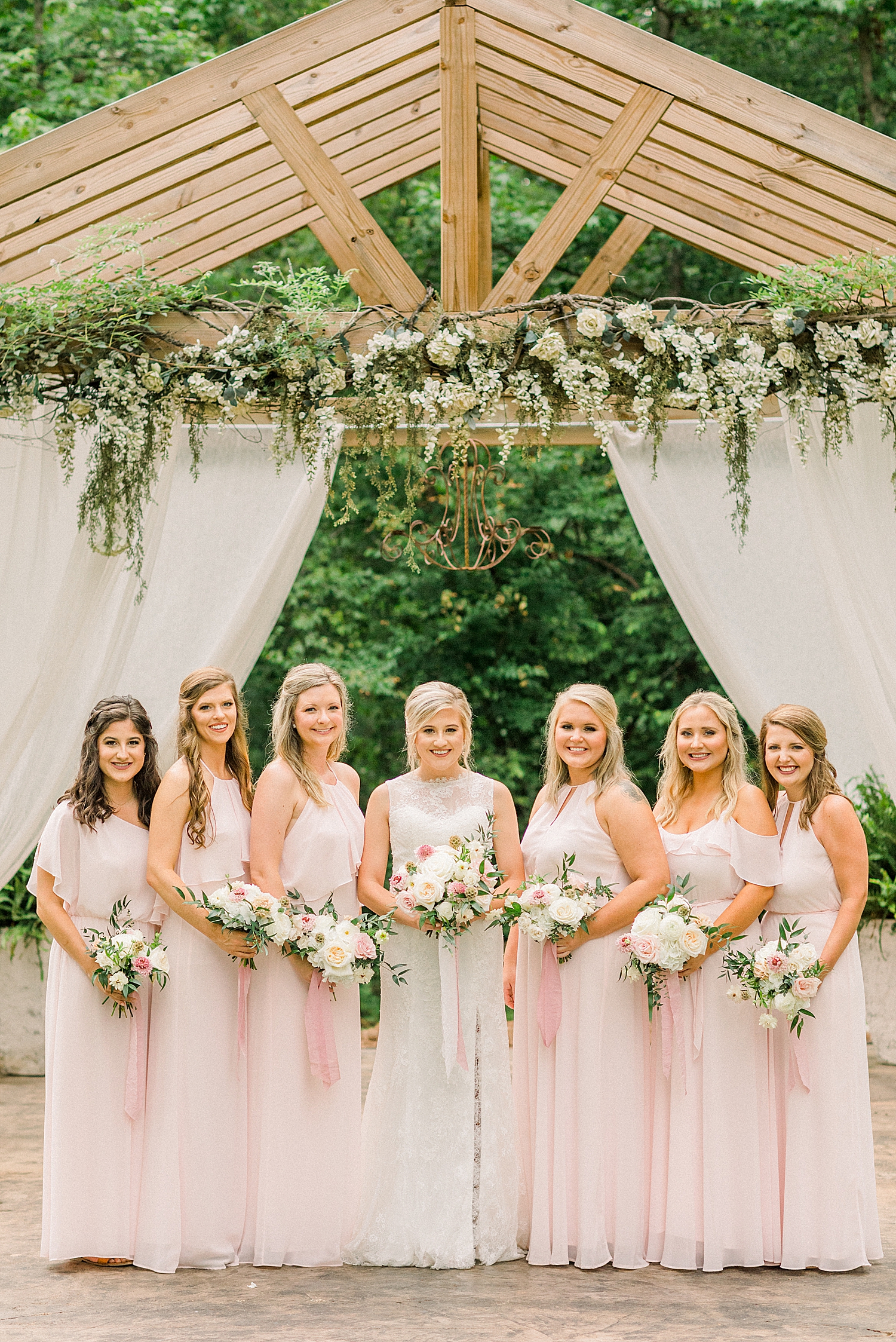 Creekside Meadows bridal party portraits of bridesmaids in pink gowns
