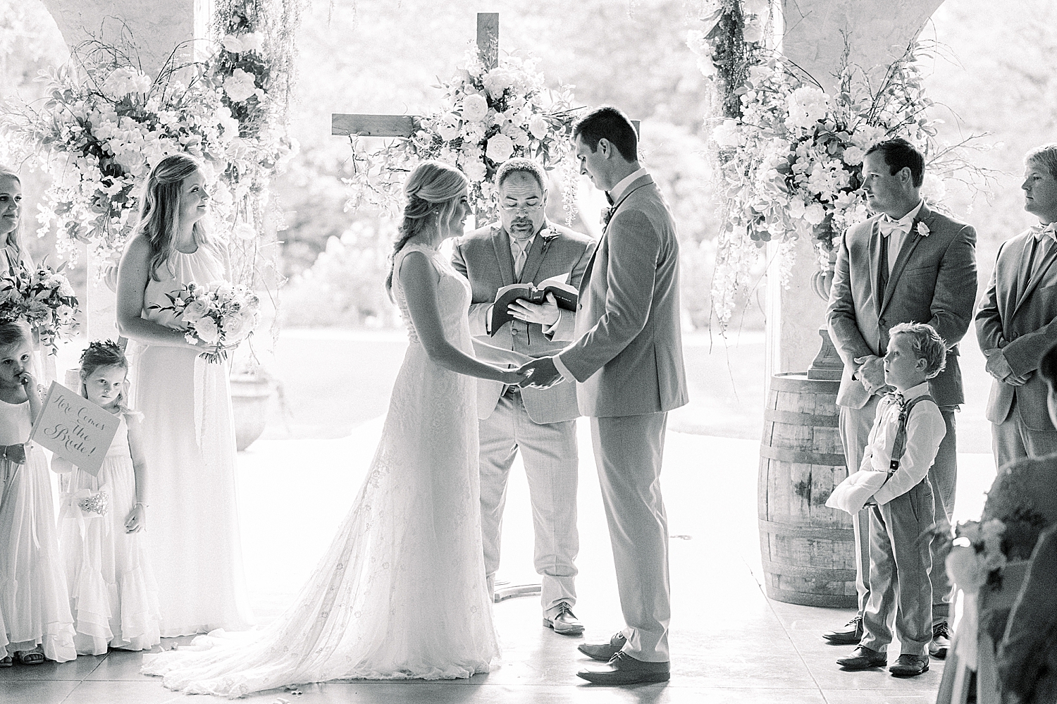 bride and groom exchange vows at Creekside Meadows