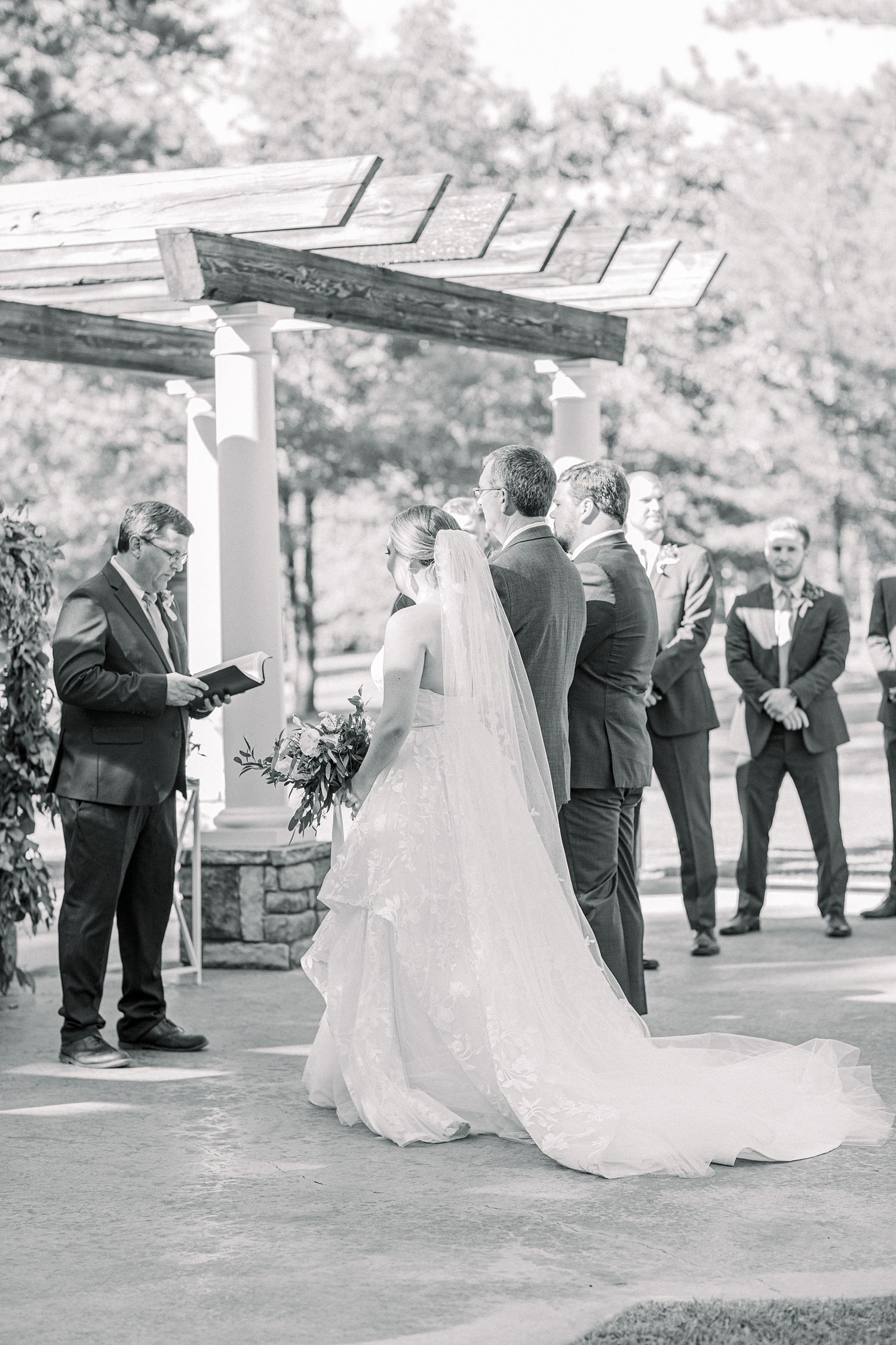 elegant outdoor wedding ceremony in Alabama on patio at Douglas Manor
