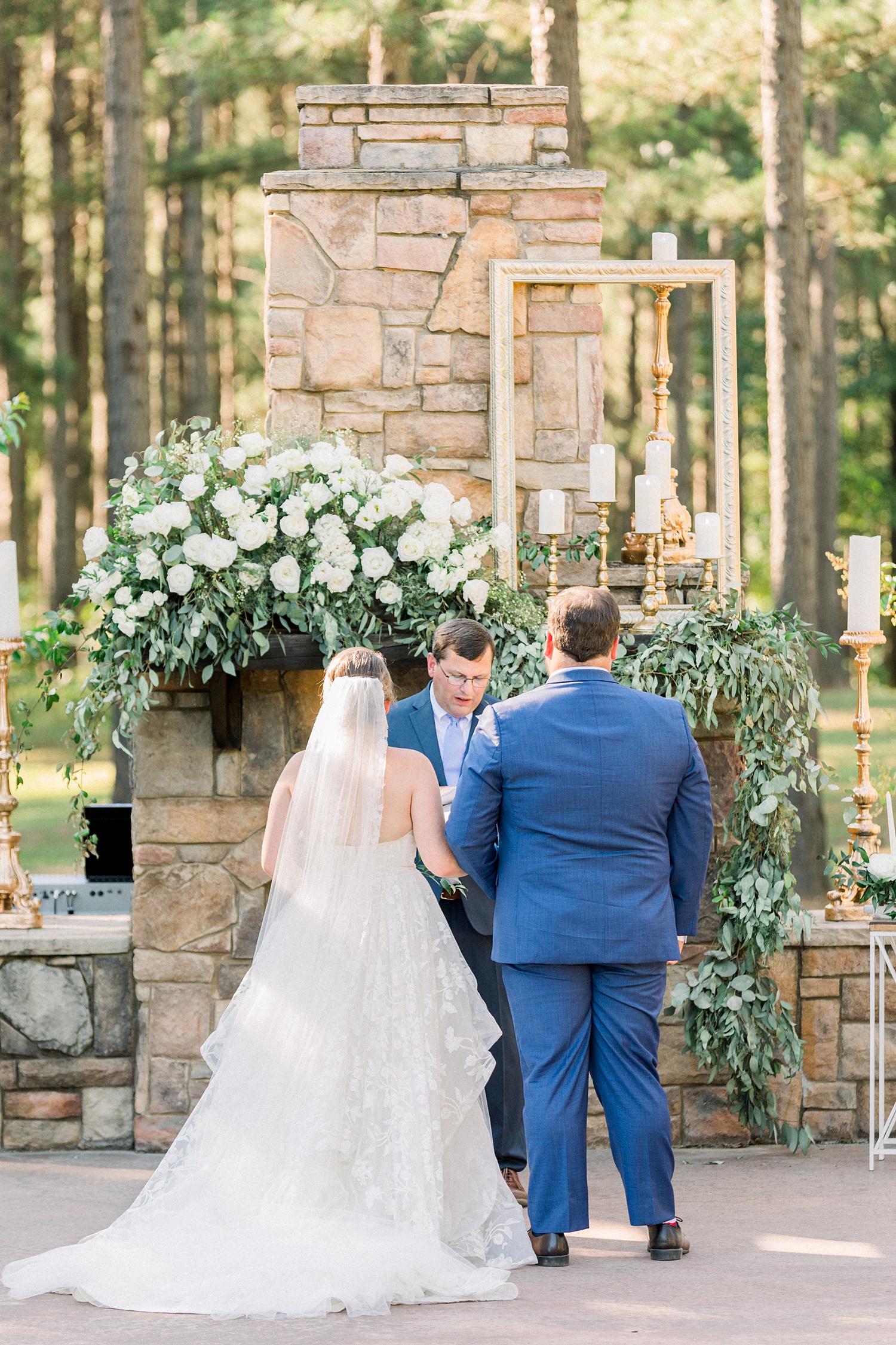 elegant outdoor wedding ceremony in Alabama on patio at Douglas Manor