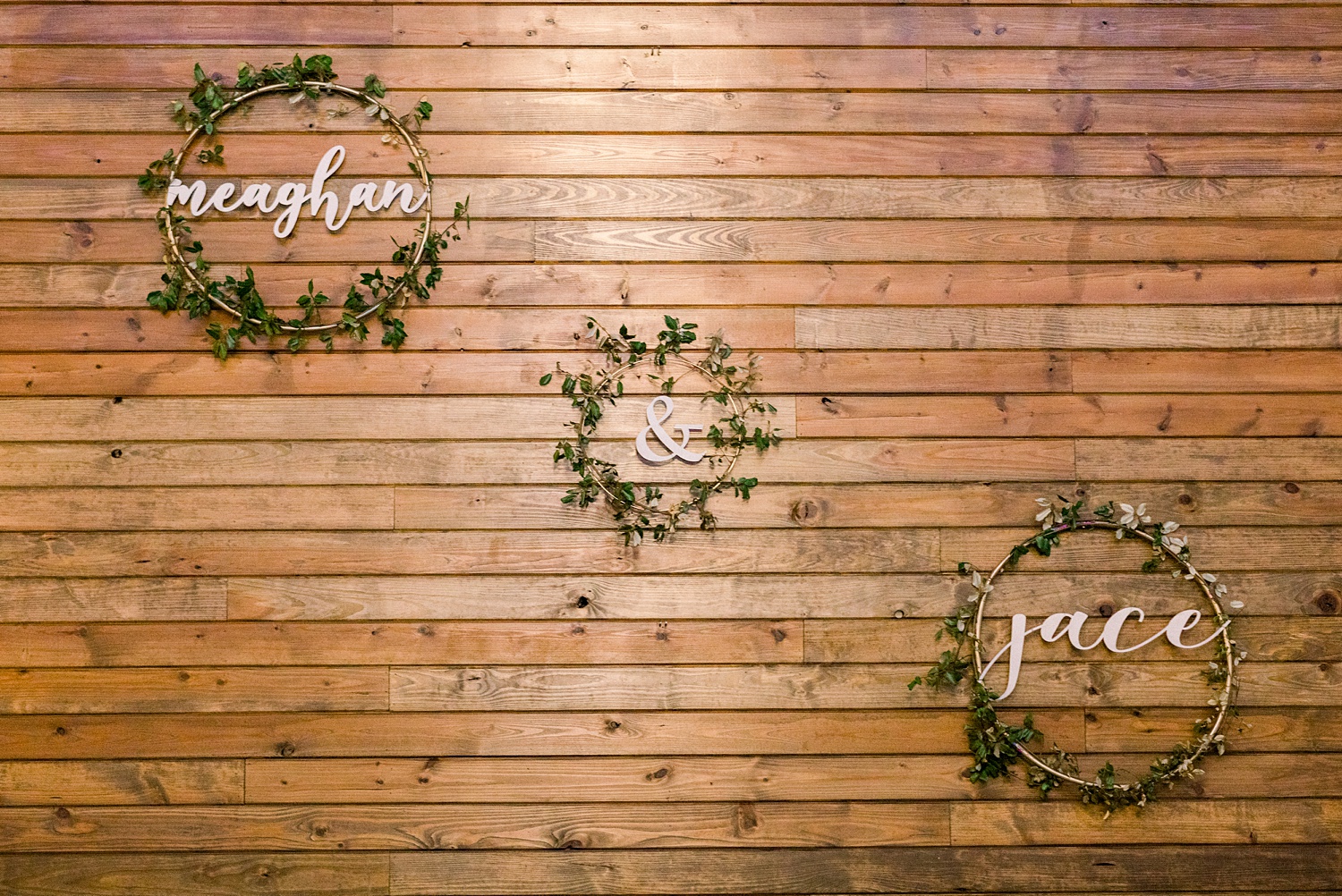 newlyweds names hang on wood wall in Alabama