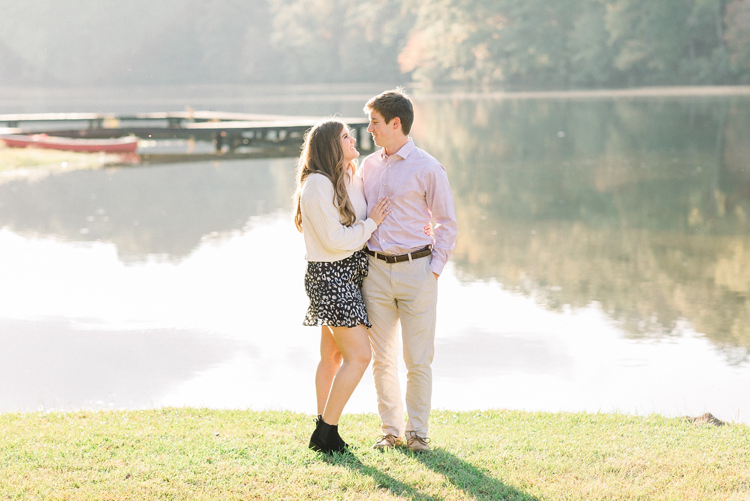 fall Oak Mountain State Park Engagement Session with young couple by lake