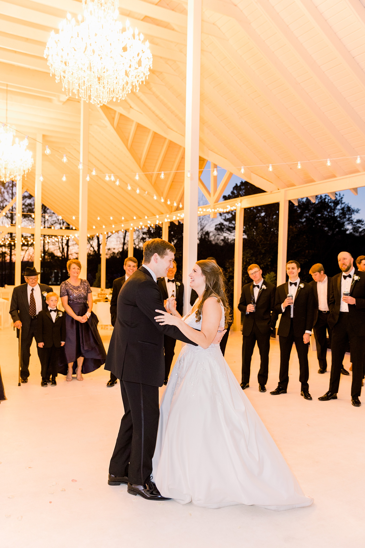 bride and groom have first dance during Alabama wedding reception