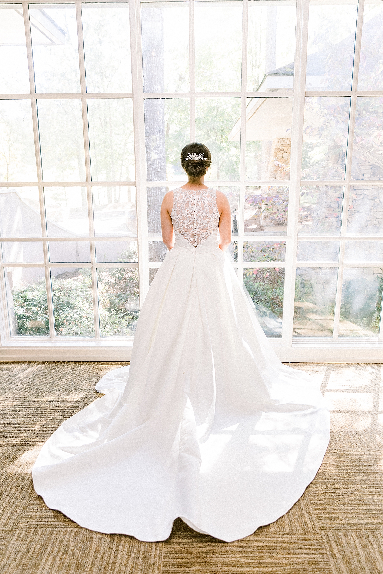 bridal portrait with bride facing window in Alabama
