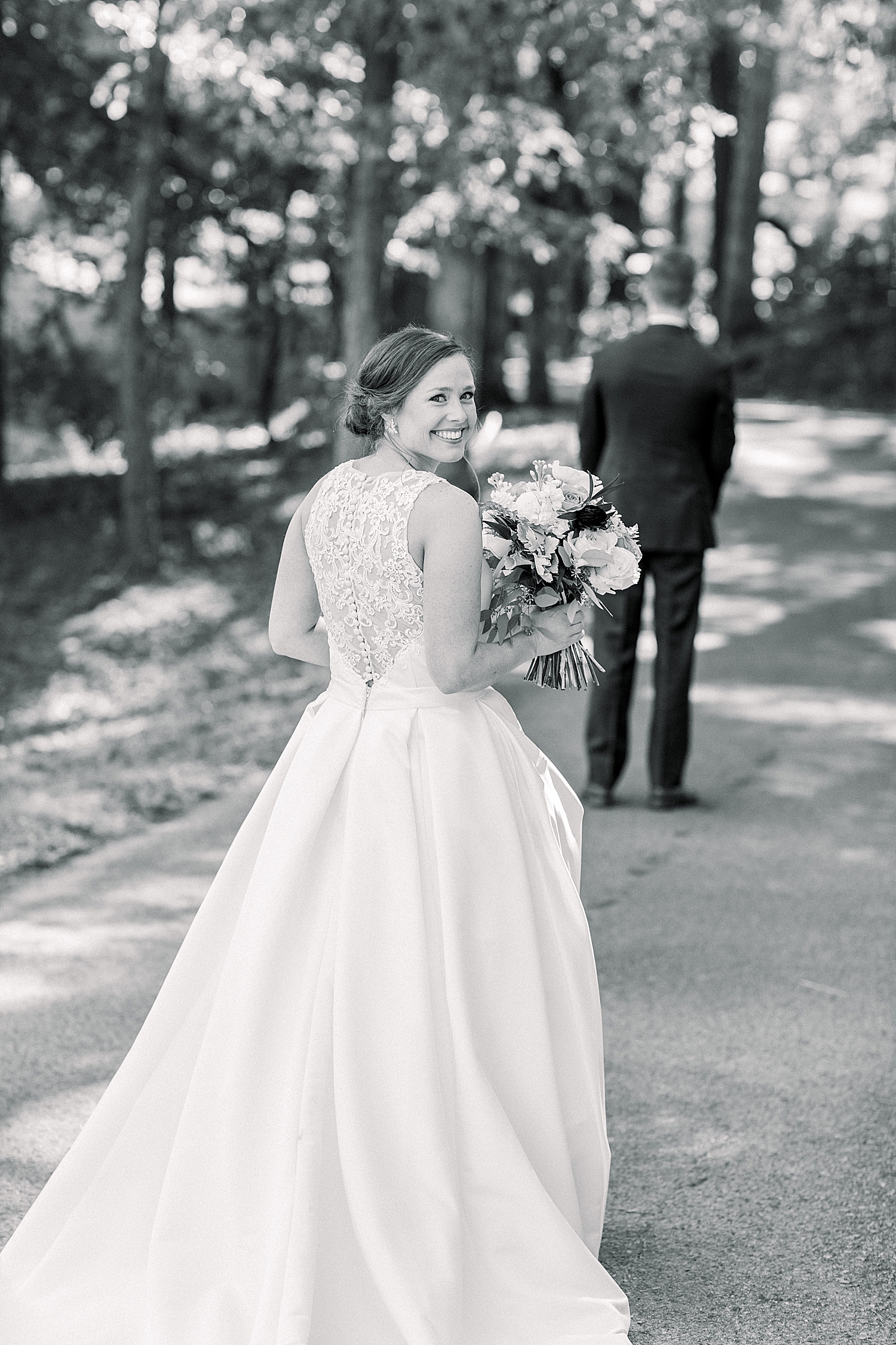bride approaches groom for first look at Riverchase Country Club