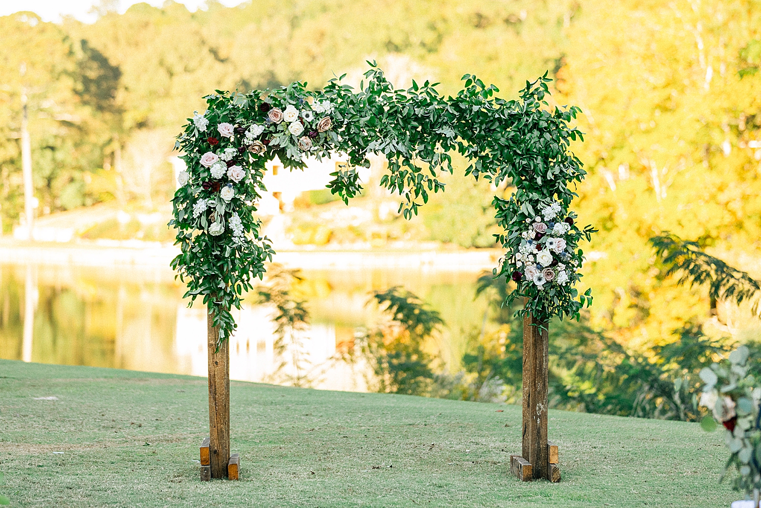floral arbor for Riverchase Country Club fall wedding ceremony