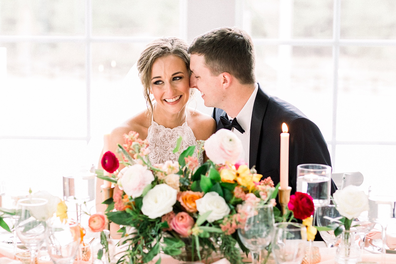 groom nuzzles bride's cheek during Alabama wedding photos