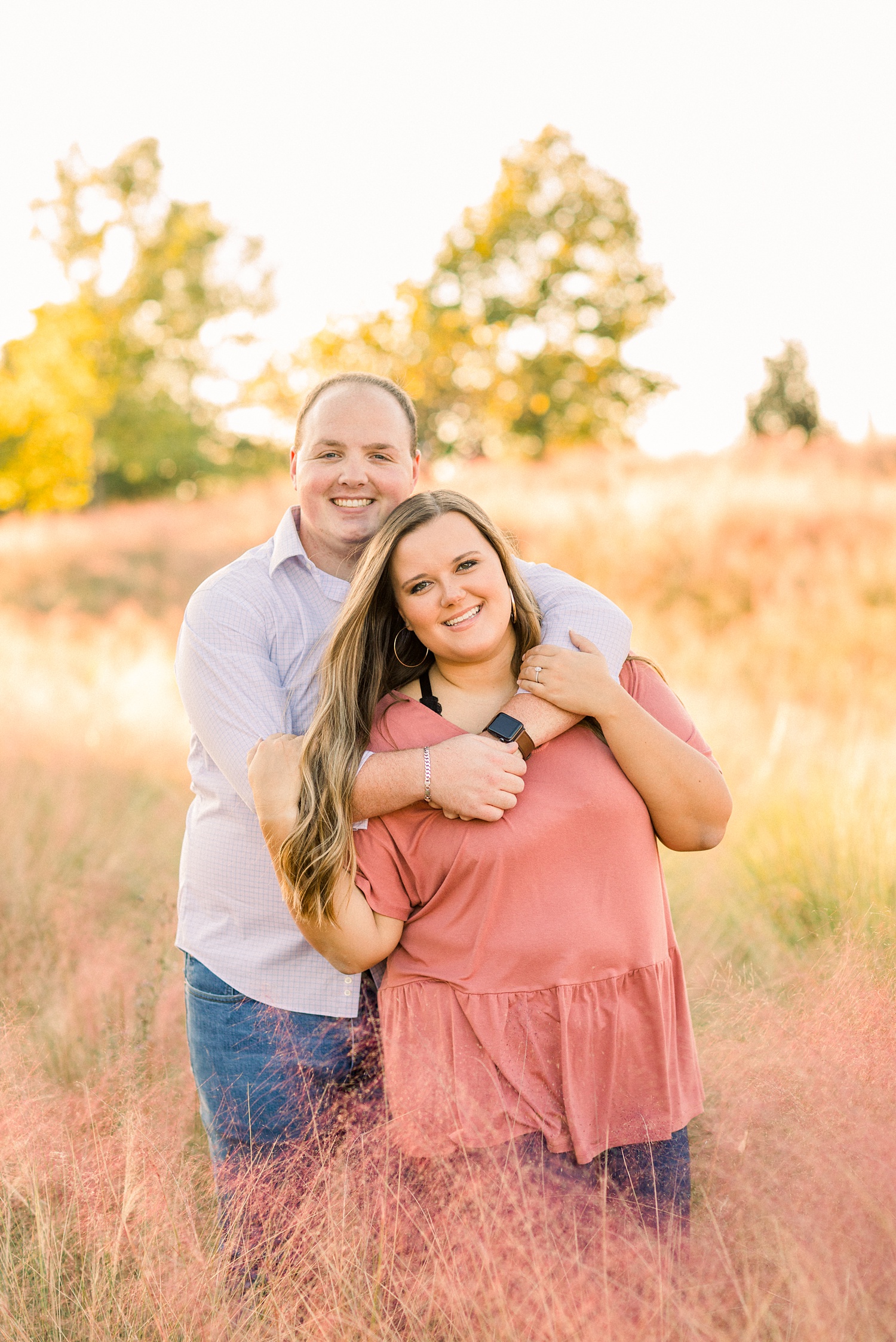 Alabama engagement portraits in field with tall grass