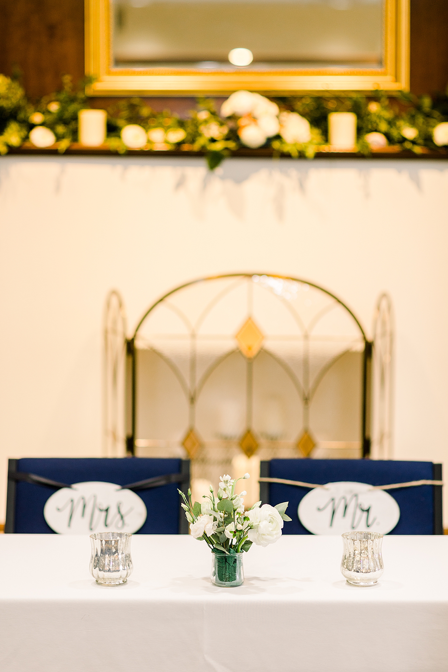 sweetheart table with navy blue and white details