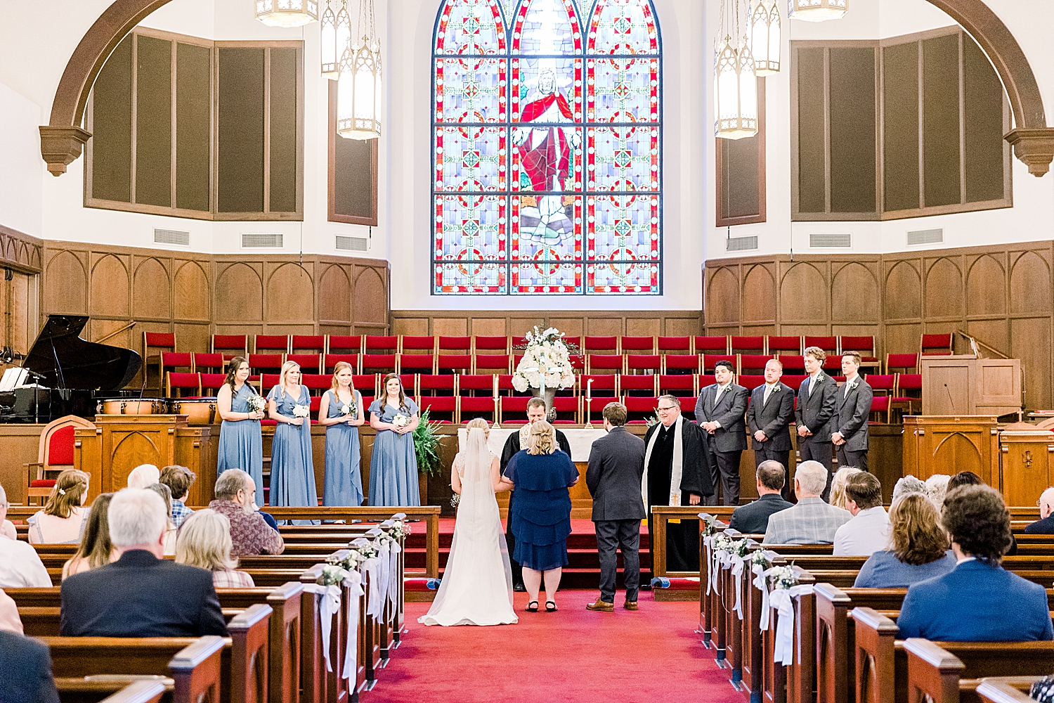 mother gives bride away during traditional church wedding in Birmingham AL