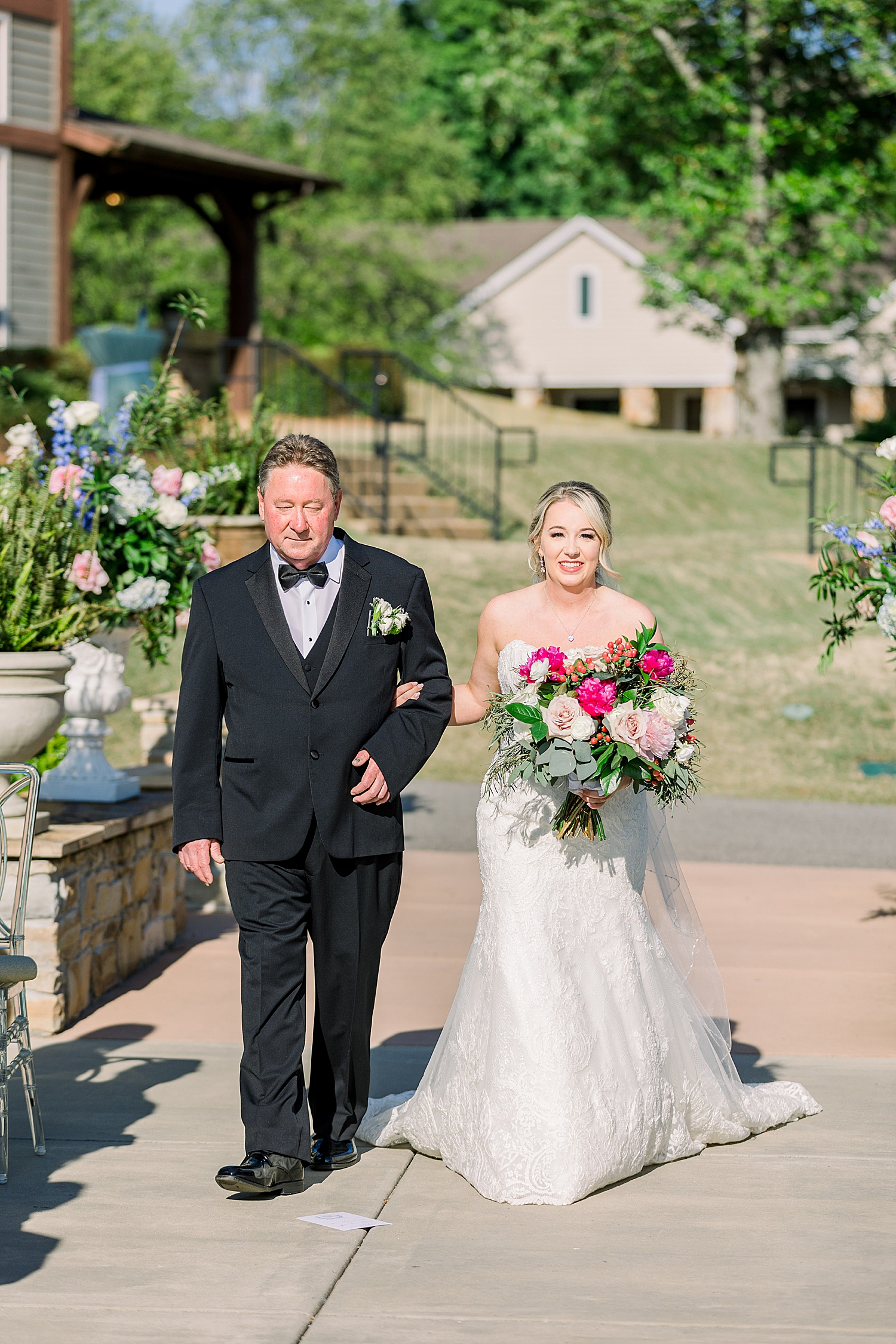 bride and dad walk into ceremony at Burritt on the Mountain