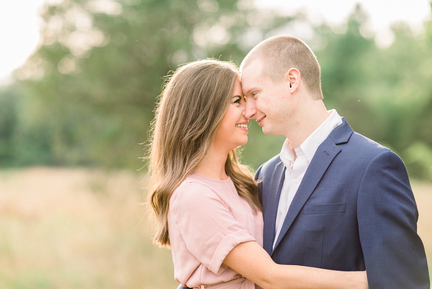 bride and groom stand nose to nose during Montevallo AL engagement portraits