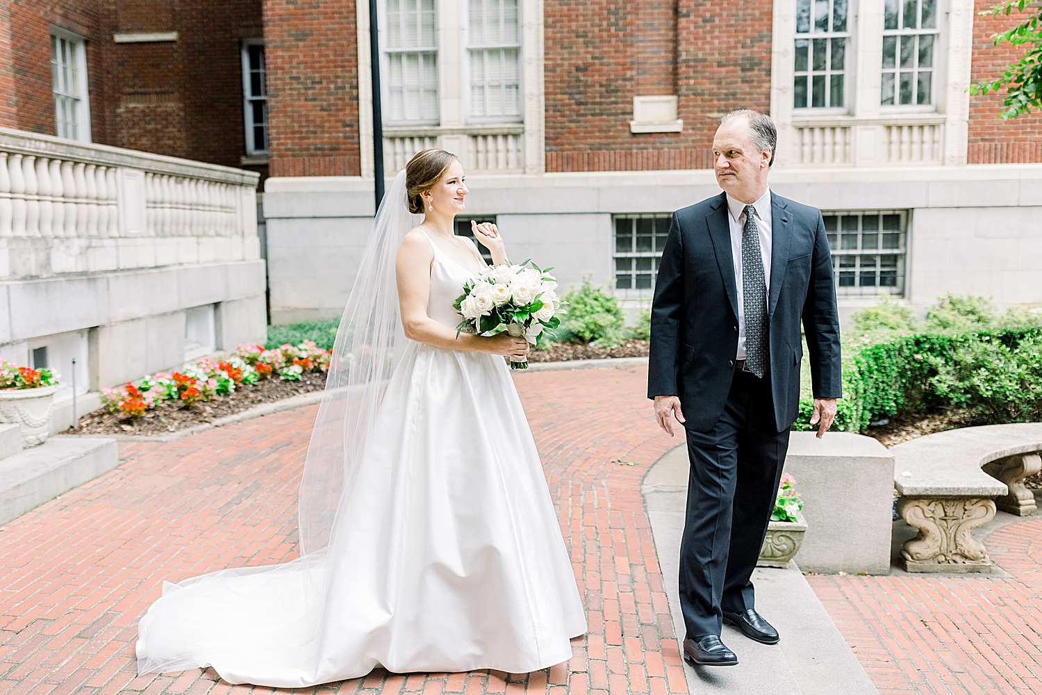 bride and dad have first look at Tutwiler Hotel