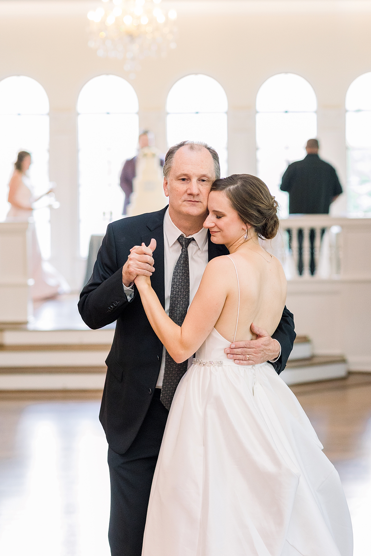 bride dances with father during The Florentine Building wedding reception
