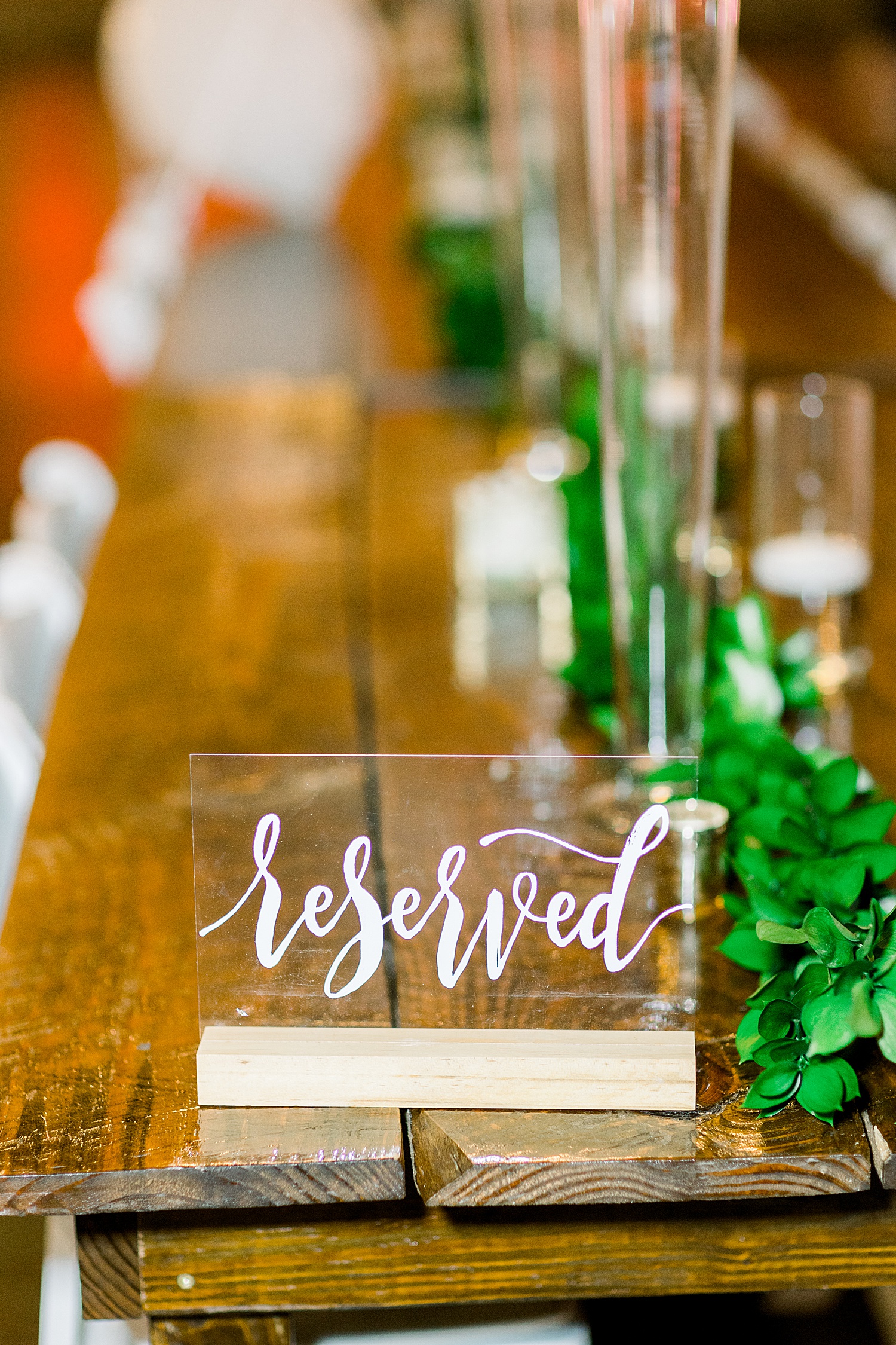 reserved sign on wooden table at reception