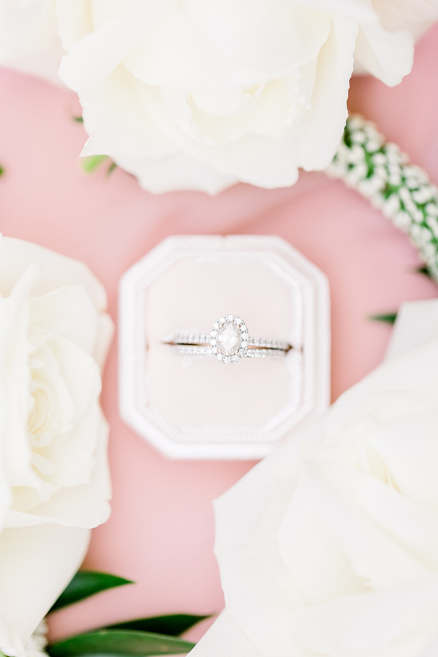 diamond ring sits in ivory box before Douglas Manor wedding