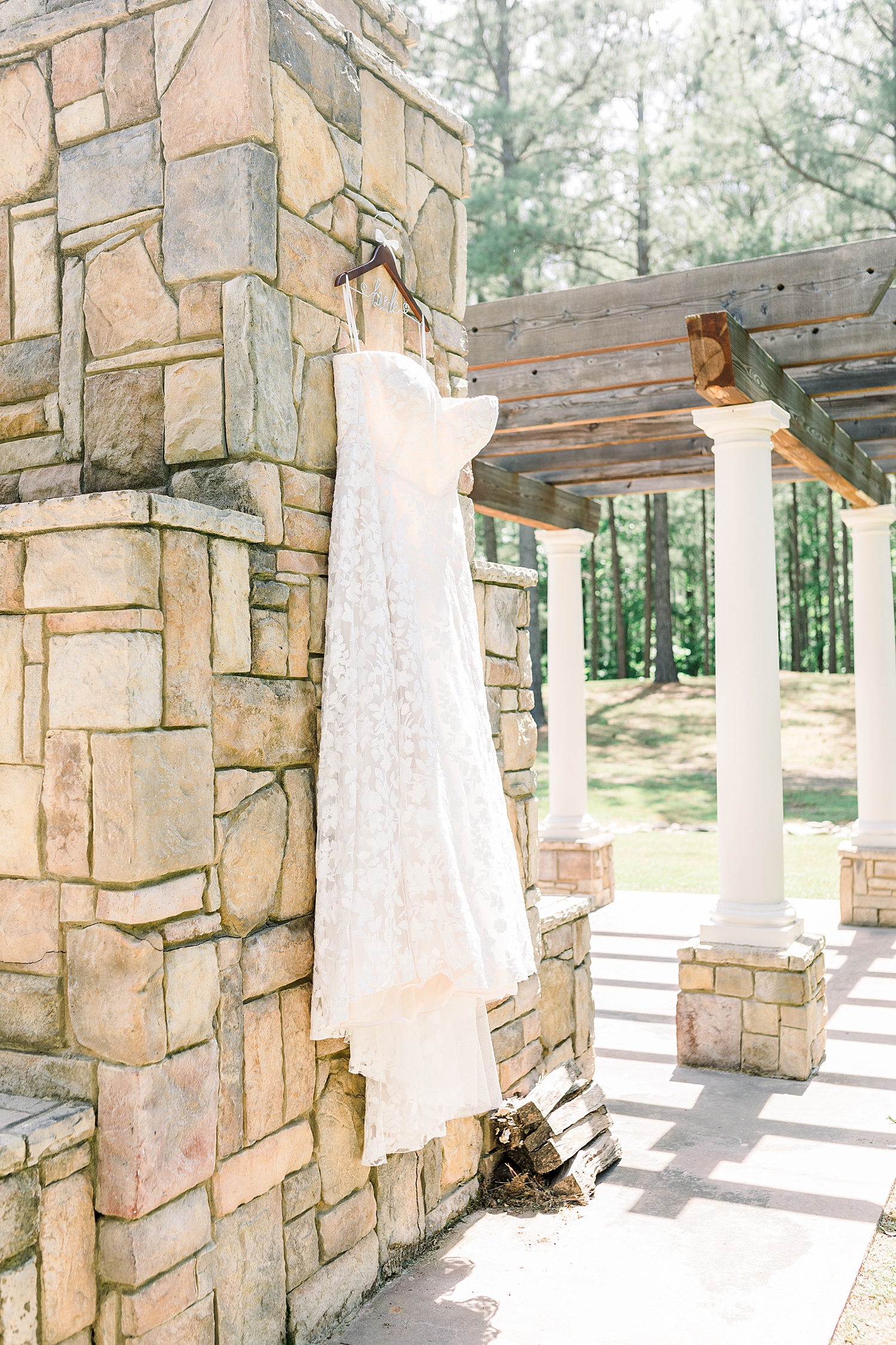 wedding dress hangs from fireplace at Douglas Manor