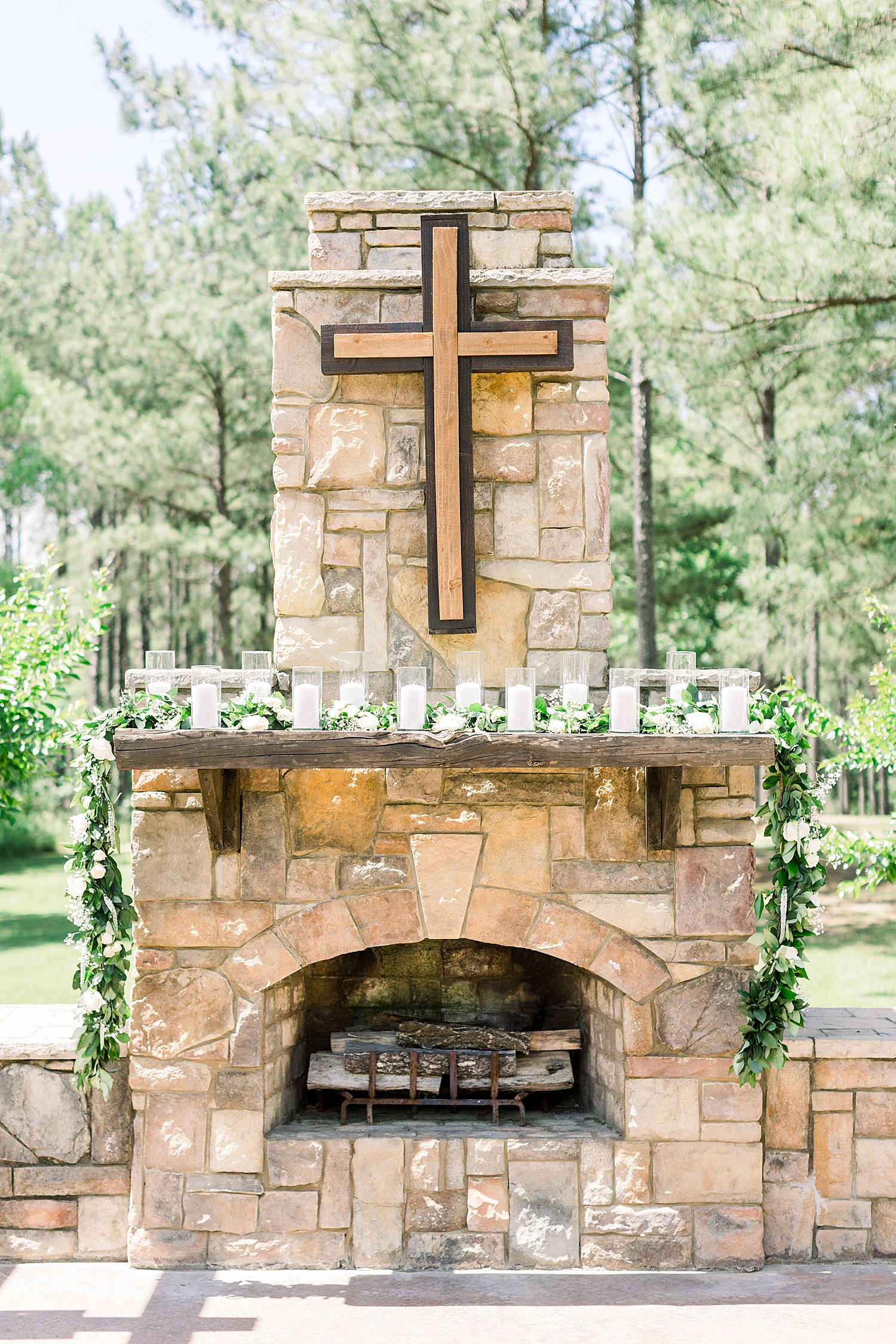 fireplace with cross for wedding ceremony at Douglas Manor