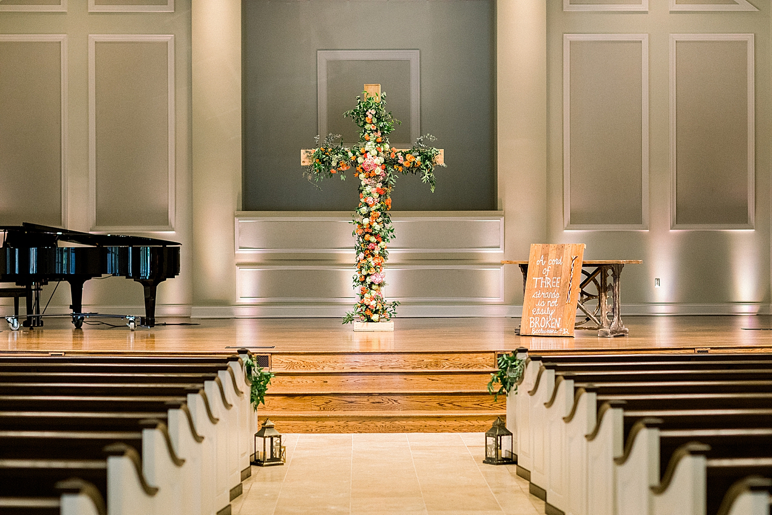 wedding ceremony in Birmingham with floral covered cross