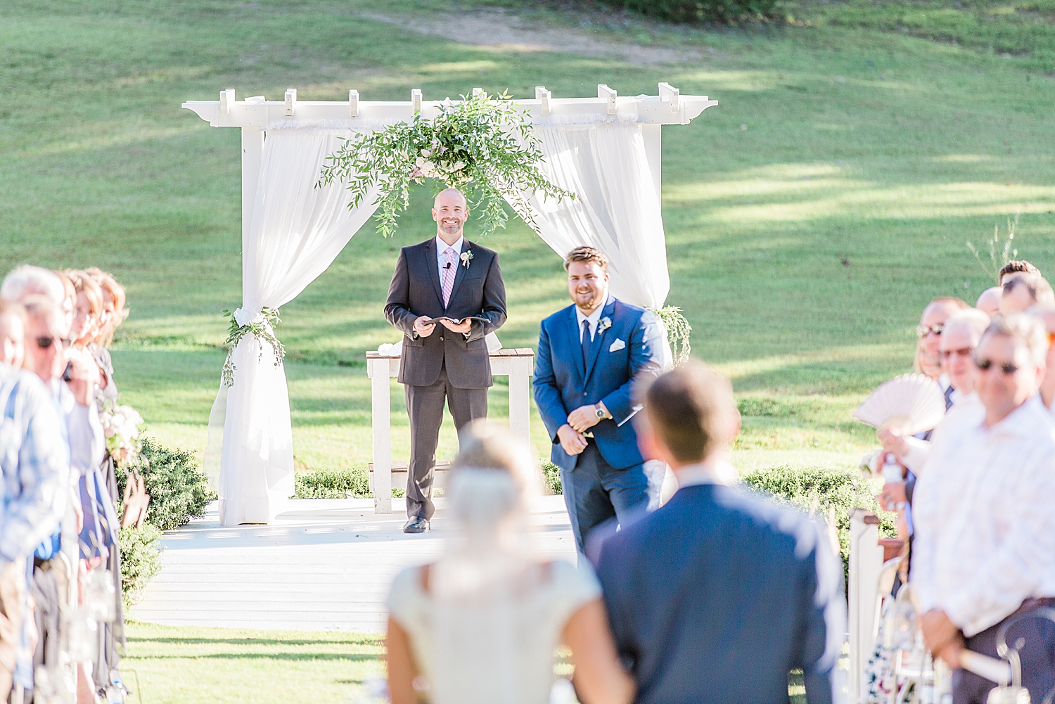 father walks daughter down the aisle to her future husband at AL wedding