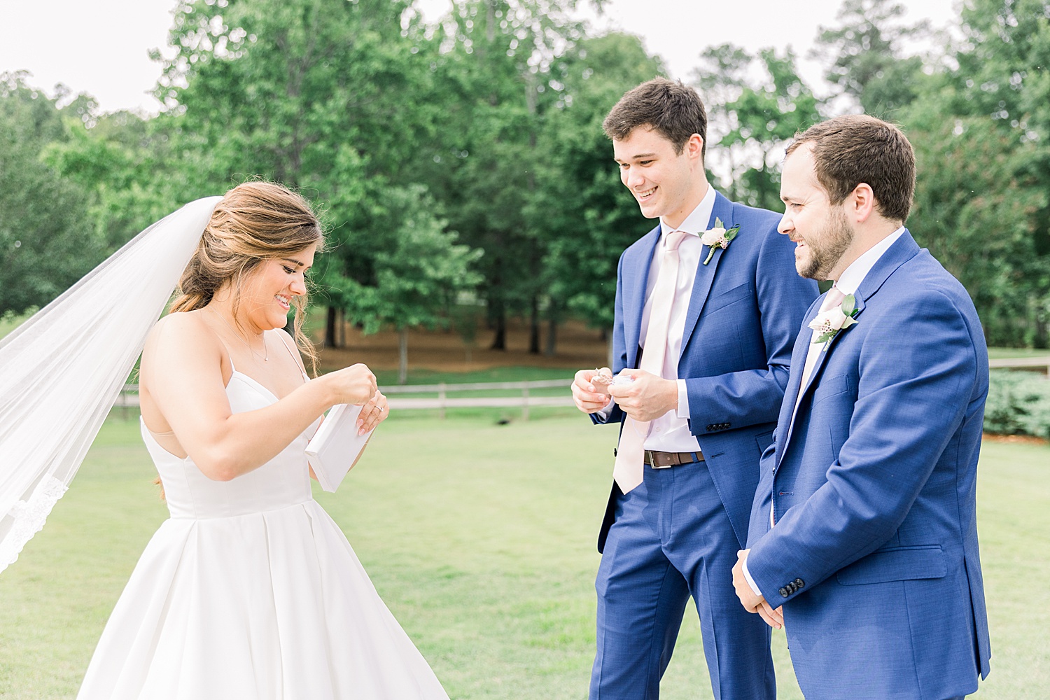 Brothers give gifts to their sister before Wedding ceremony at The Barn at Shady Lane in Birmingham, AL