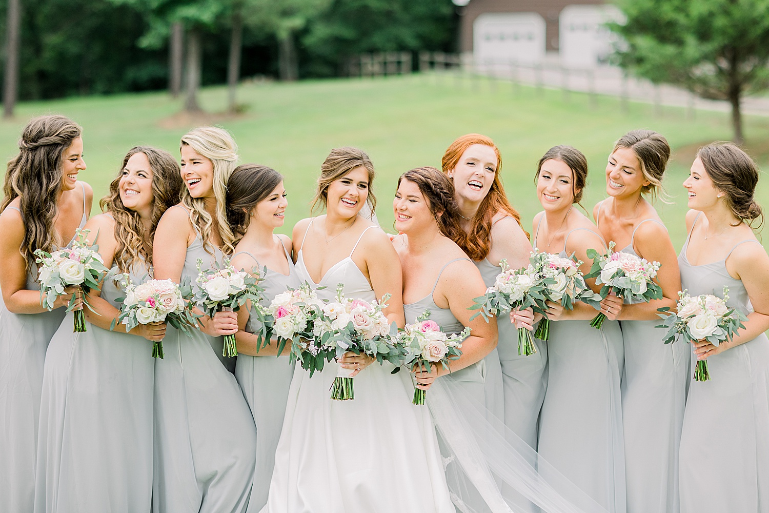 bride and bridesmaids with bouquets in Birmingham AL
