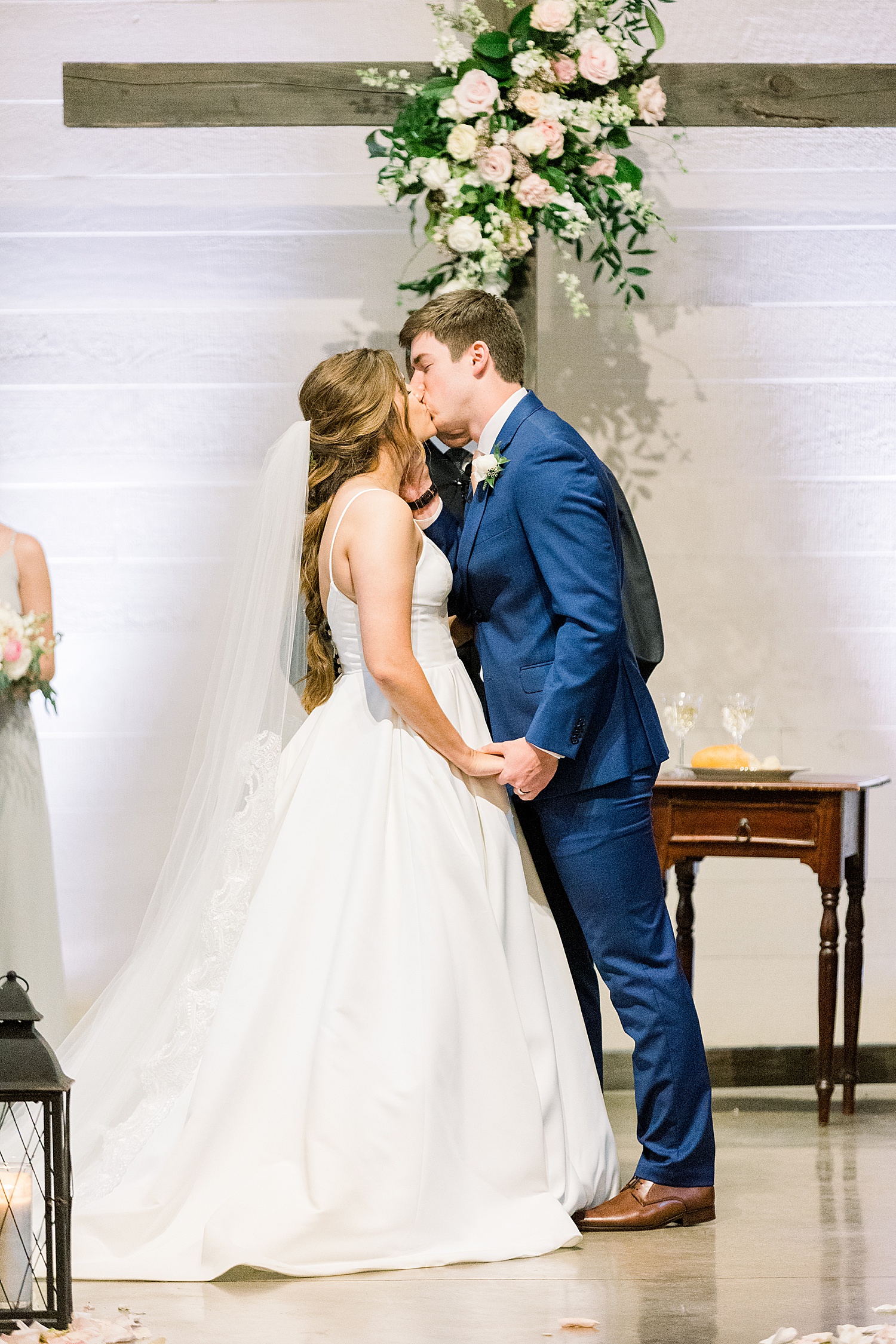 Bride + groom share first kiss as husband and wife captured by Chelsea Morton Photography