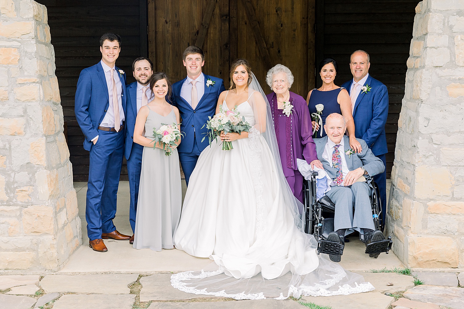 bride + groom with immediate family during AL wedding captured by Chelsea Morton Photography