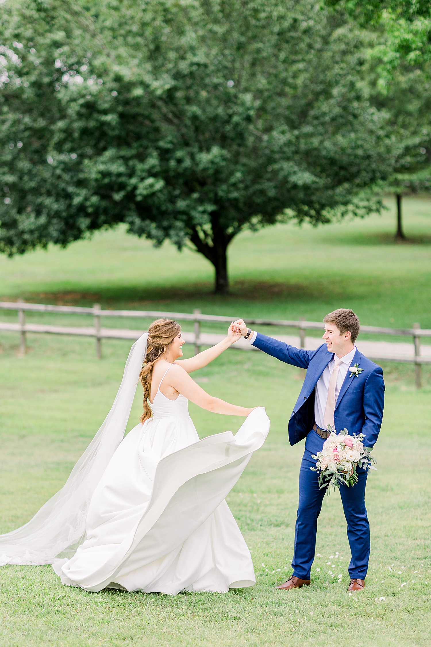bride + groom dance + Celebrate on the grounds of The Barn at Shady Lane in Birmingham AL