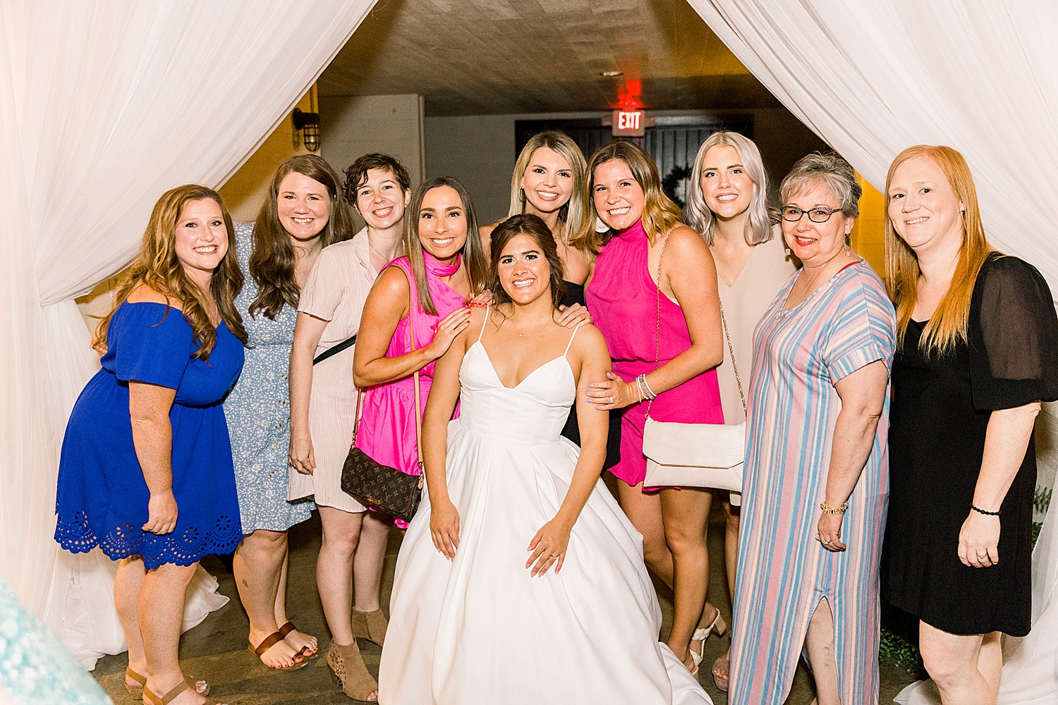 bride with guests at wedding reception