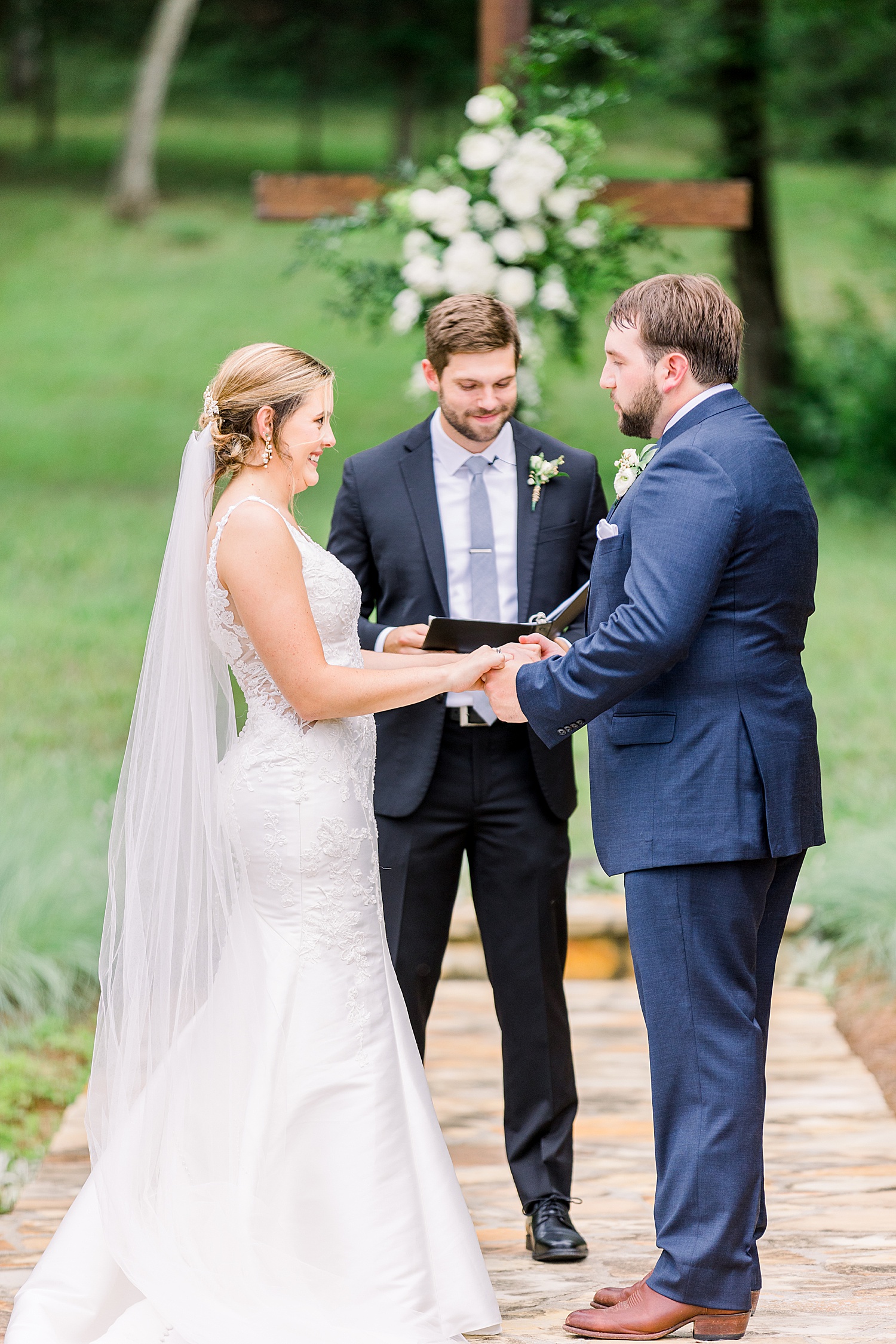 Bride + Groom exchange vows at Belle Farm Summer wedding by Chelsea Morton Photography