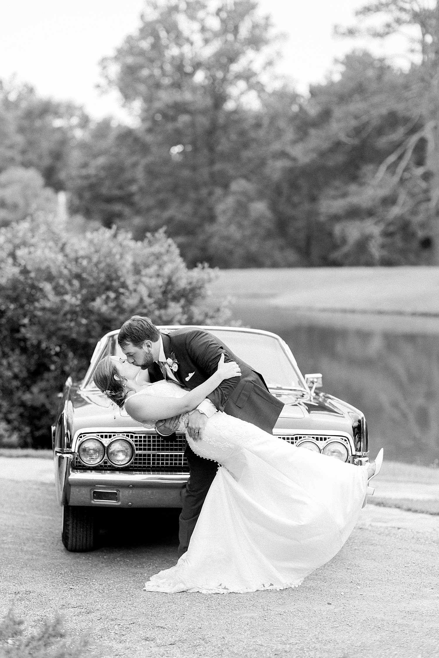husband + wife stand in front of classic car from Coats Cars at Belle Farms Wedding in Alabama by Chelsea Morton Photography