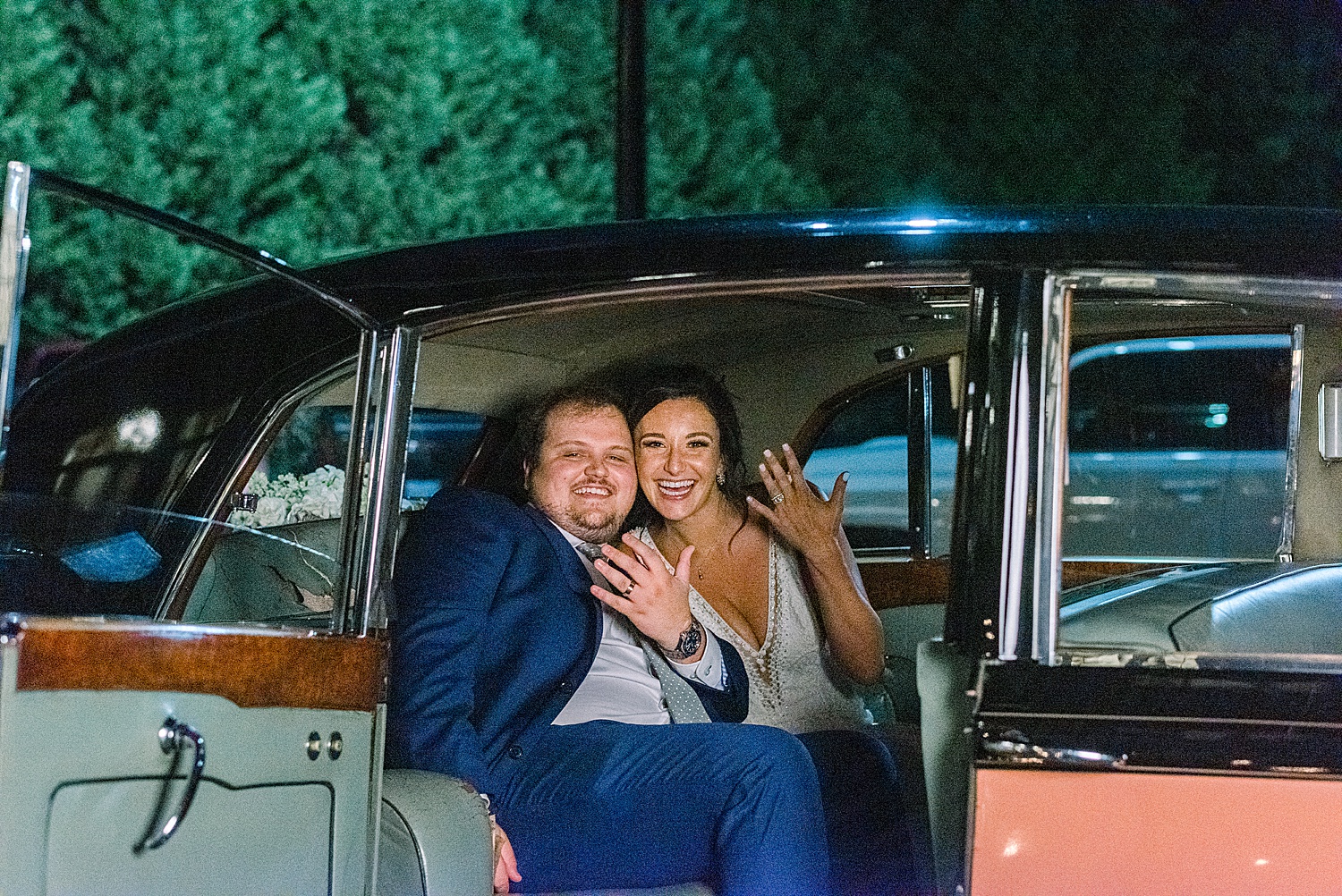 newlyweds in car at the end of AL wedding