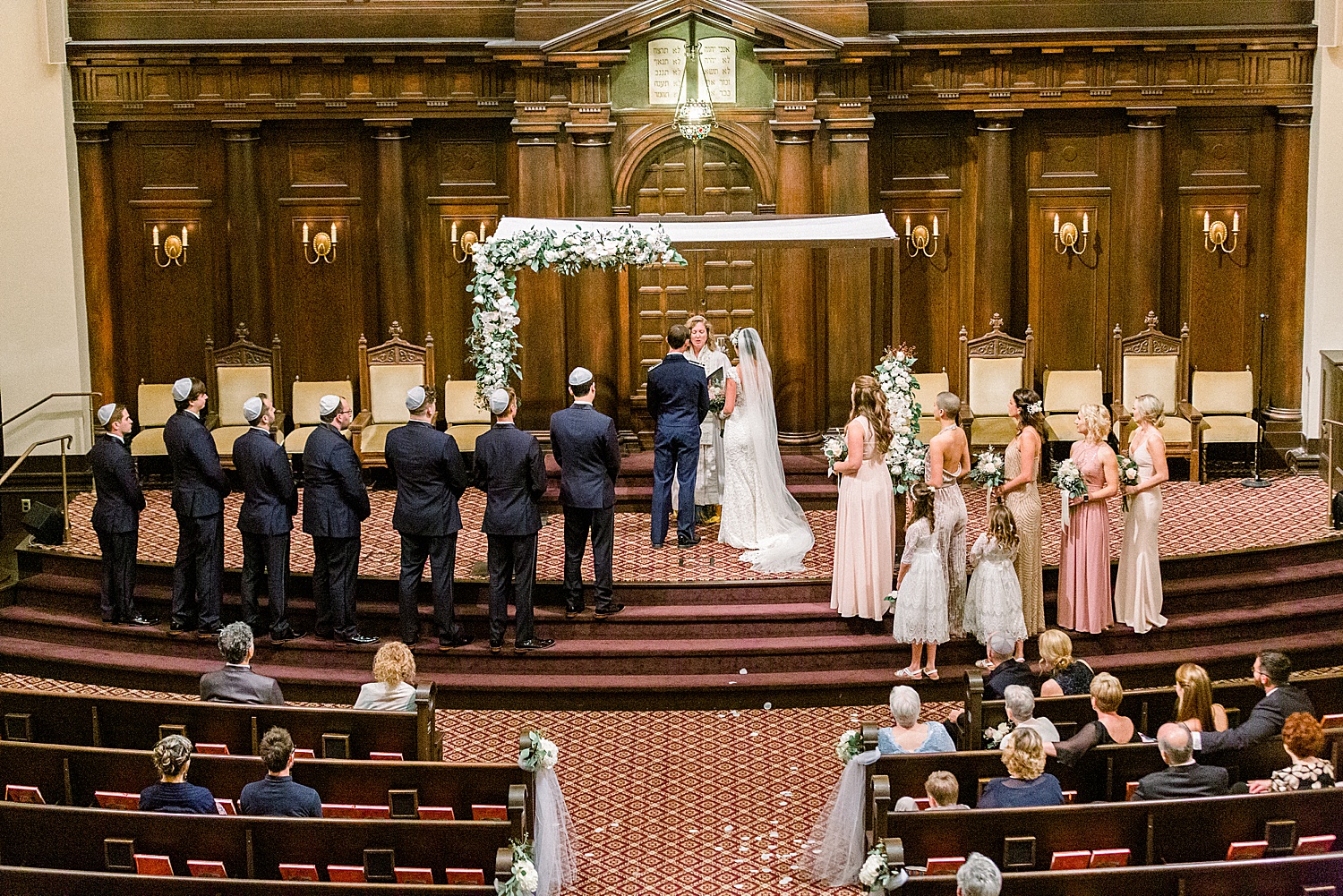 bride and groom at wedding ceremony at Temple Emanuel in Birmingham