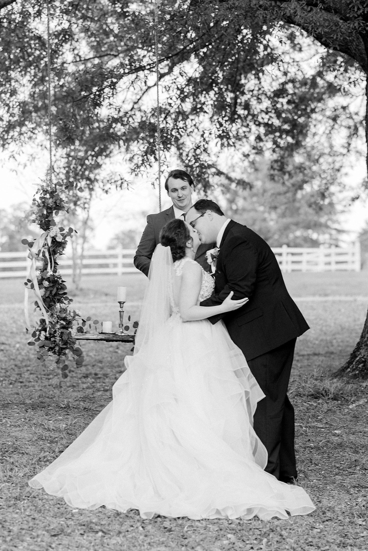couple kiss as they are announced husband + wife at AL wedding