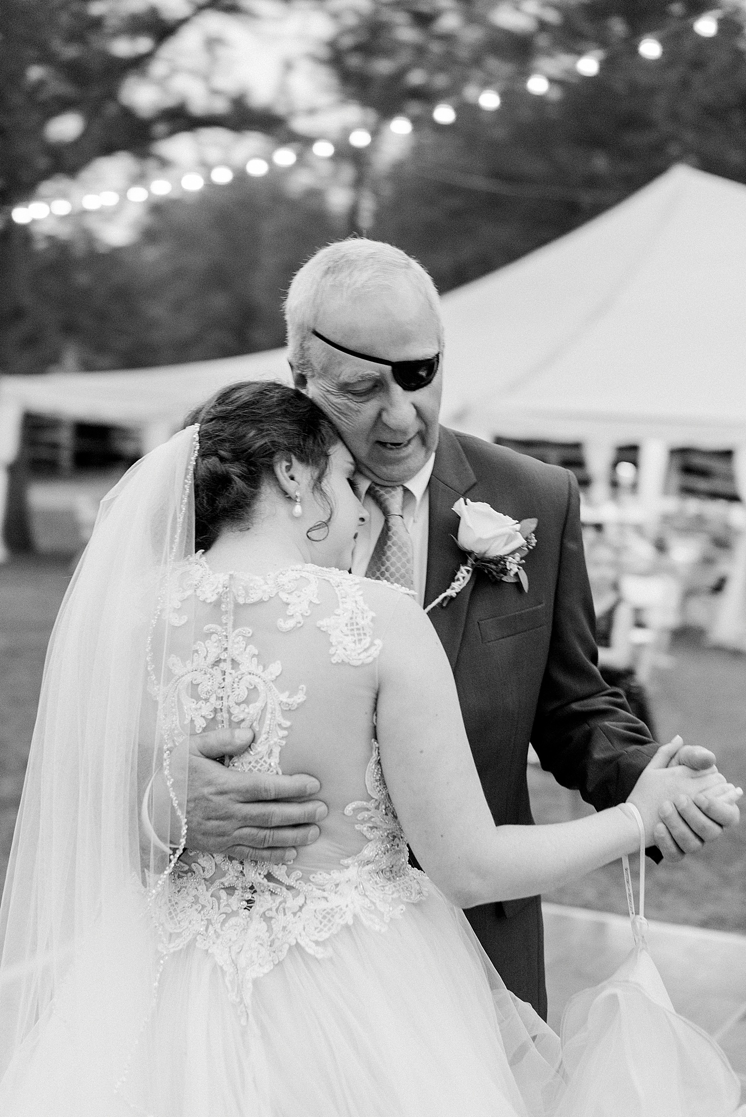 bride and father enjoy father-daughter dance