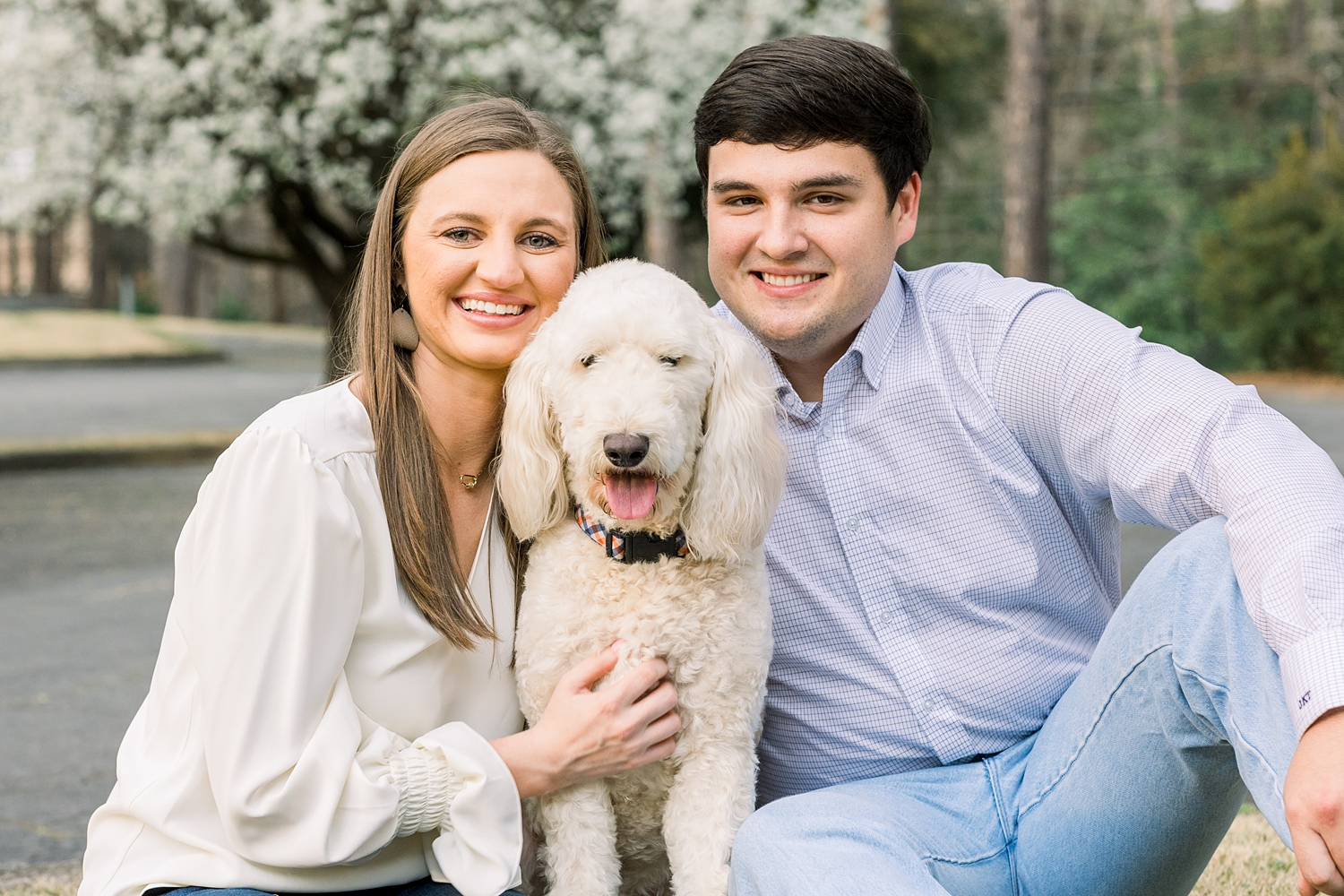 Couple with their white dog during Birmingham Alabama Engagement Session