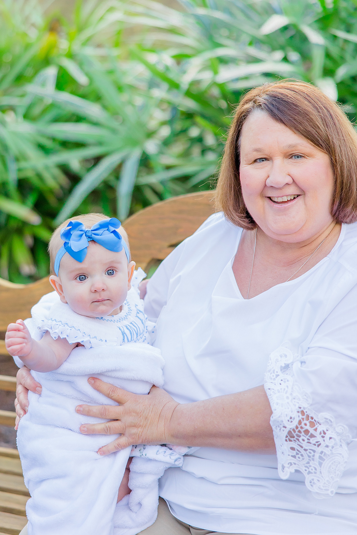 6 month old baby with her grandma during milestone portraits