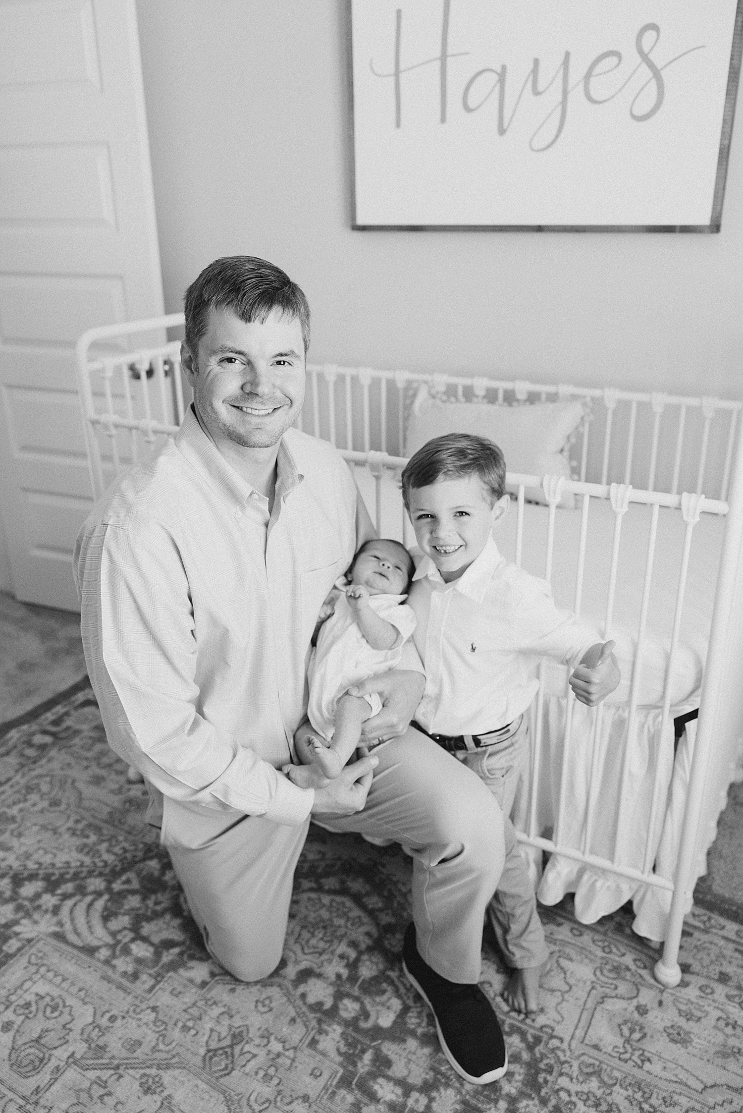 dad and his two sons during Birmingham In-Home Newborn + Family Session
