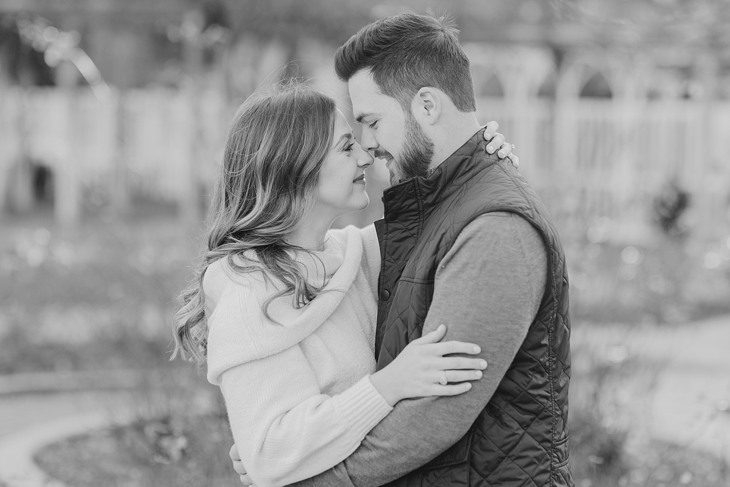 couple lean in during engagement session