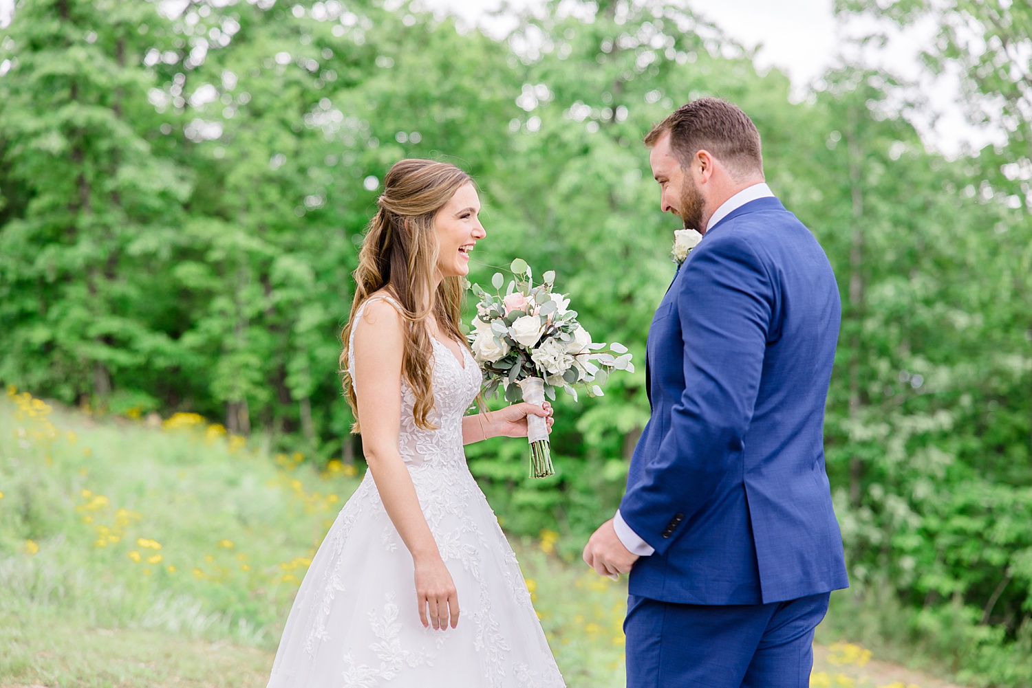 bride and groom share candid moment together 