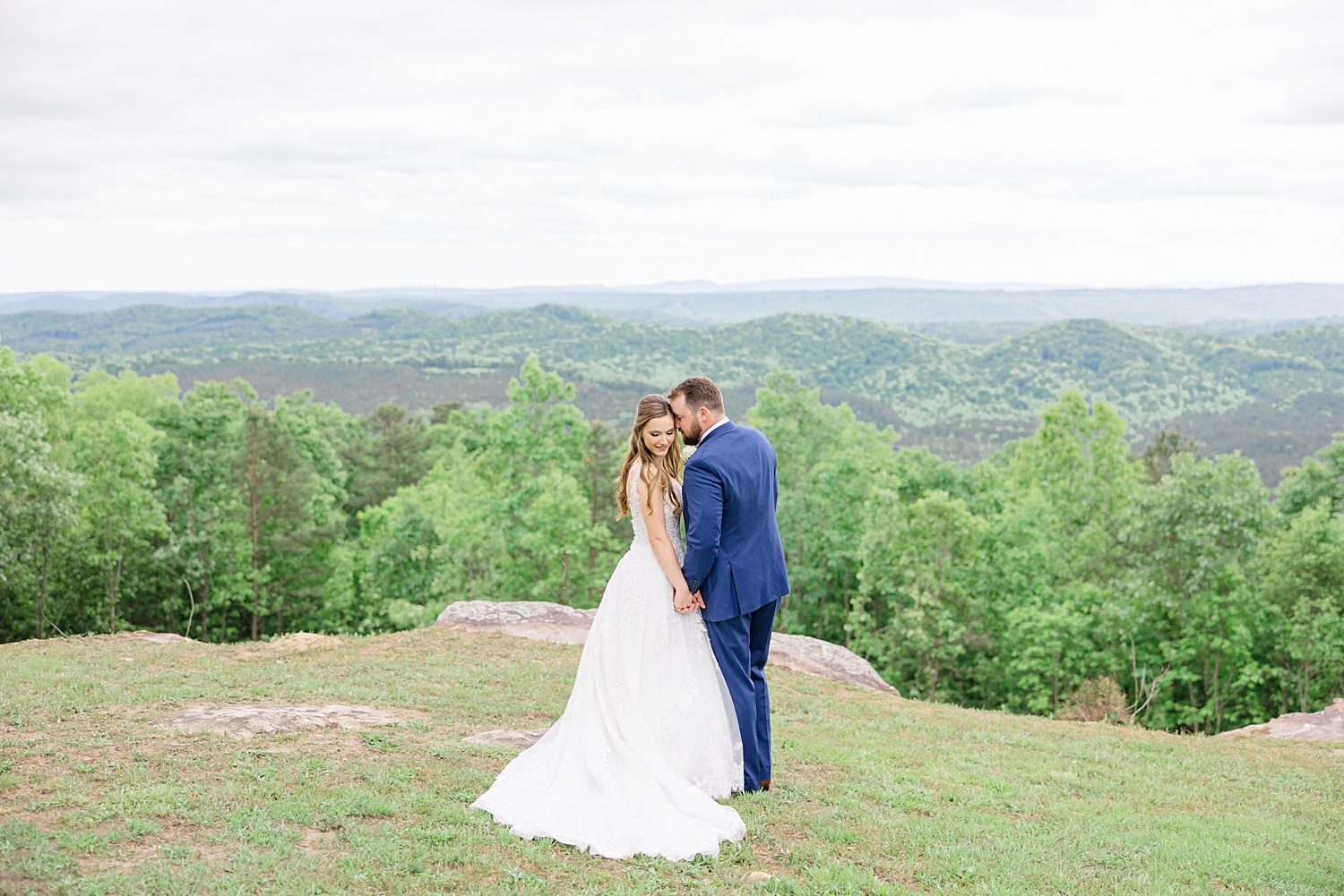 wedding portraits with beautiful natural backdrop of rolling hills and valleys at Weddings at Cabin Bluff