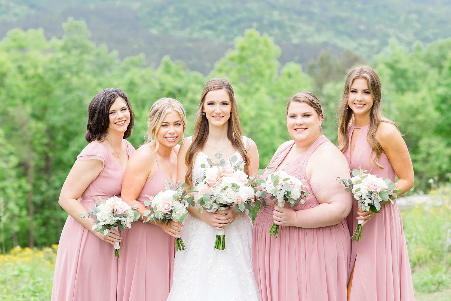 bride and bridesmaids before romantic spring wedding at Weddings at Cabin Bluff in AL 