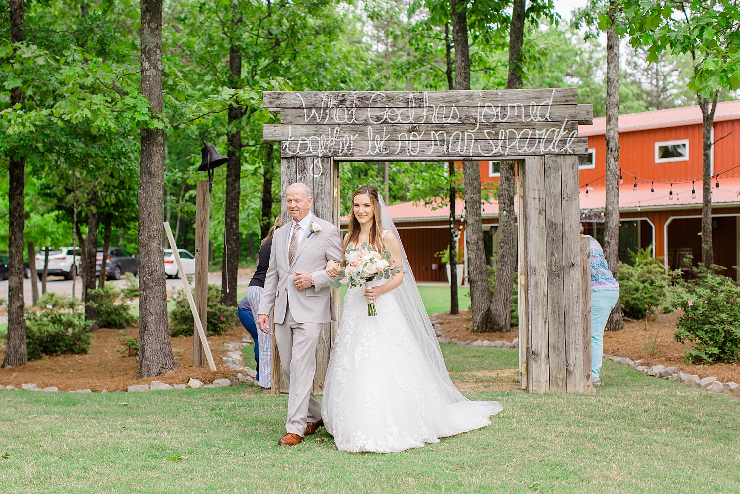 bride and father walk down the aisle at romantic Spring Wedding day at Weddings at Cabin Bluff