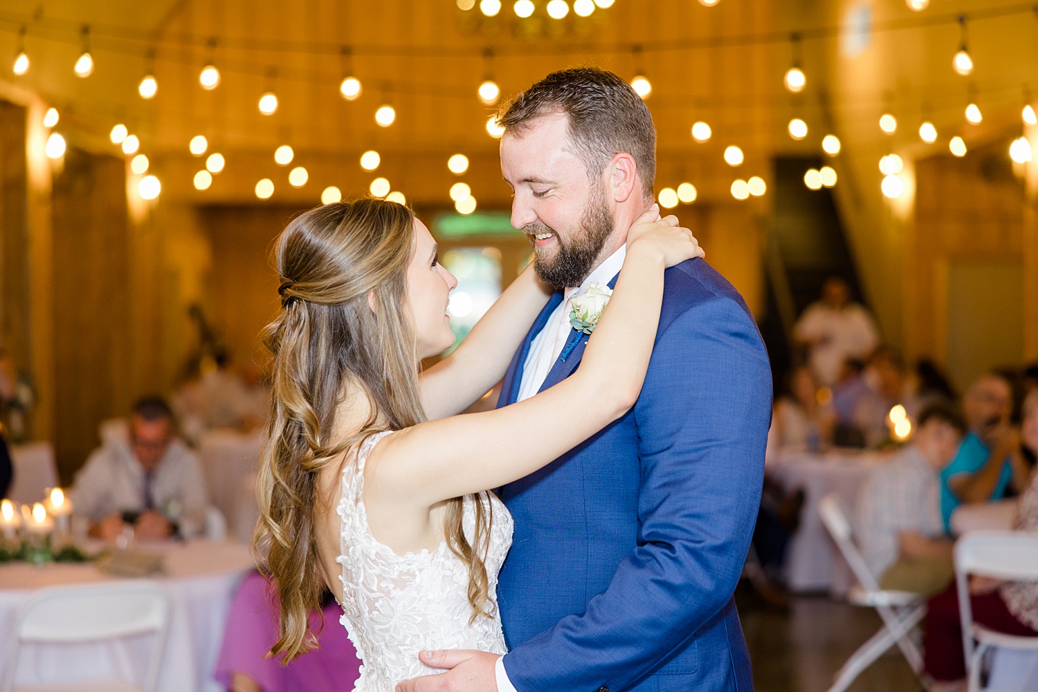 newlyweds share their first dance together as husband and wife