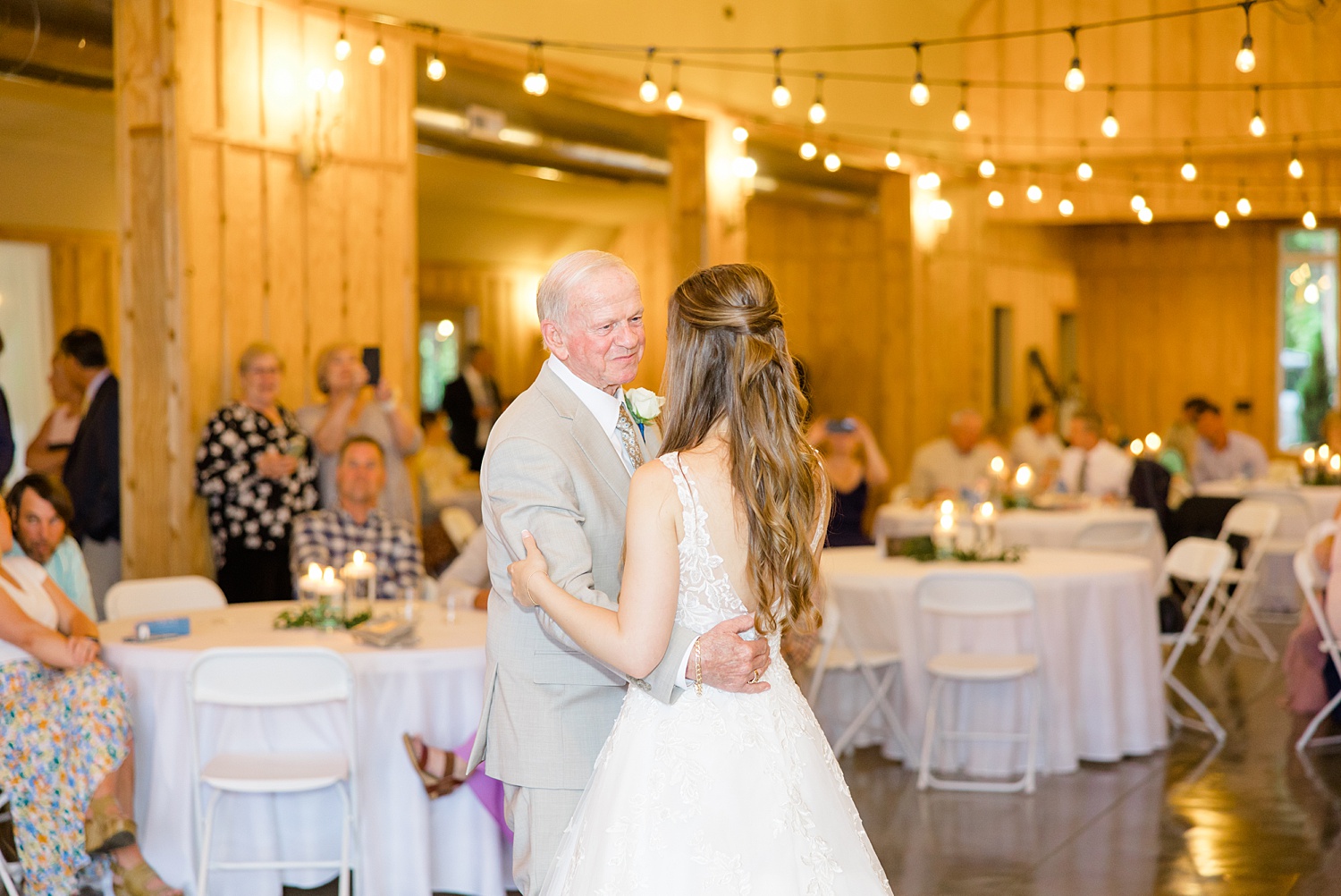 bride dances with her father at reception 