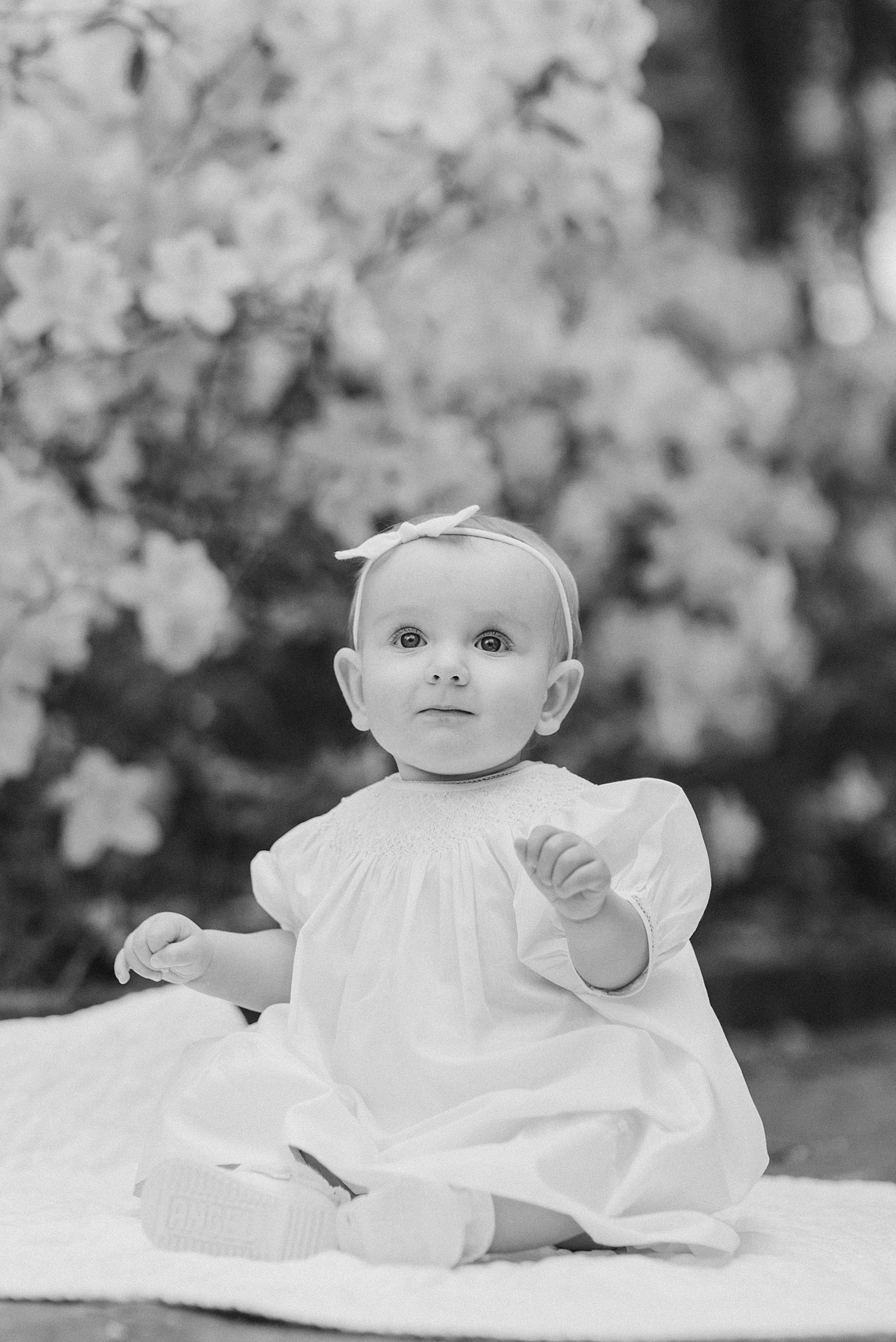 black and white portrait of 9 month old baby girl