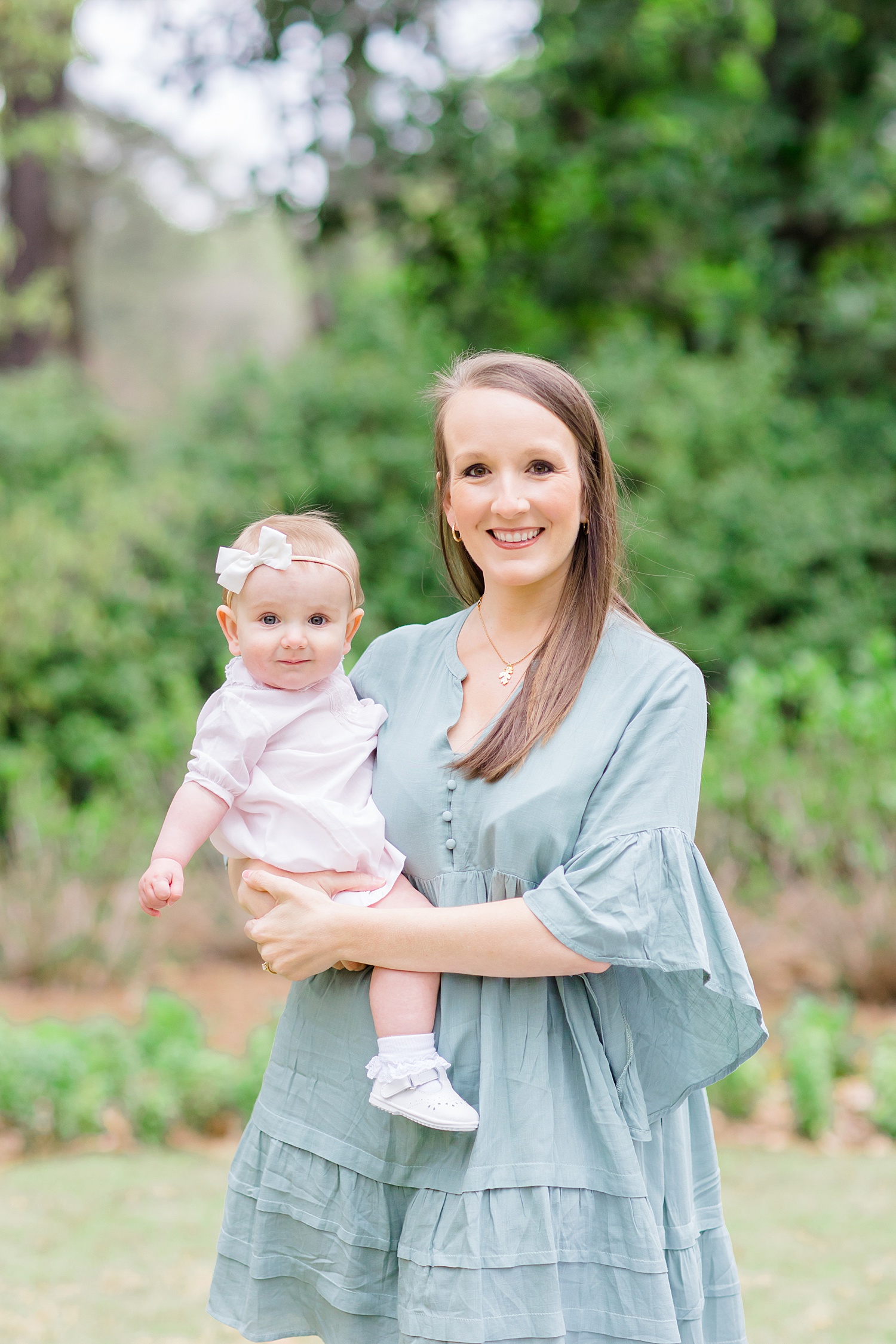 mother and daughter at Birmingham Botanical gardens for 9 month old milestone session